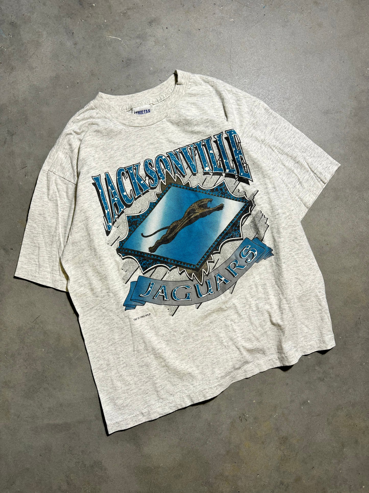 1993 Jacksonville Jaguars Vintage Heather Grey Banned Logo NFL Spellout Big Logo Tee (Large)
