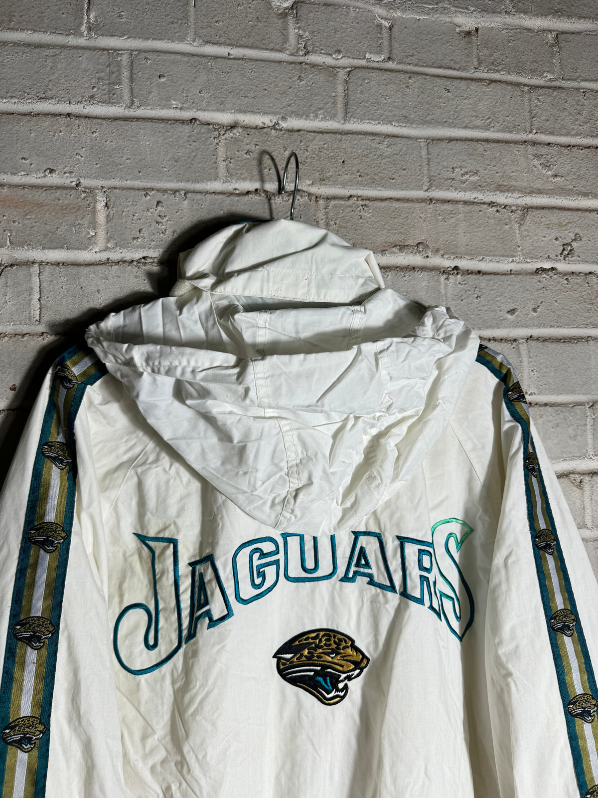 90’s Jacksonville Jaguars Vintage White Repeat Logo Pro Player Full Zip NFL Windbreaker Jacket (Medium)