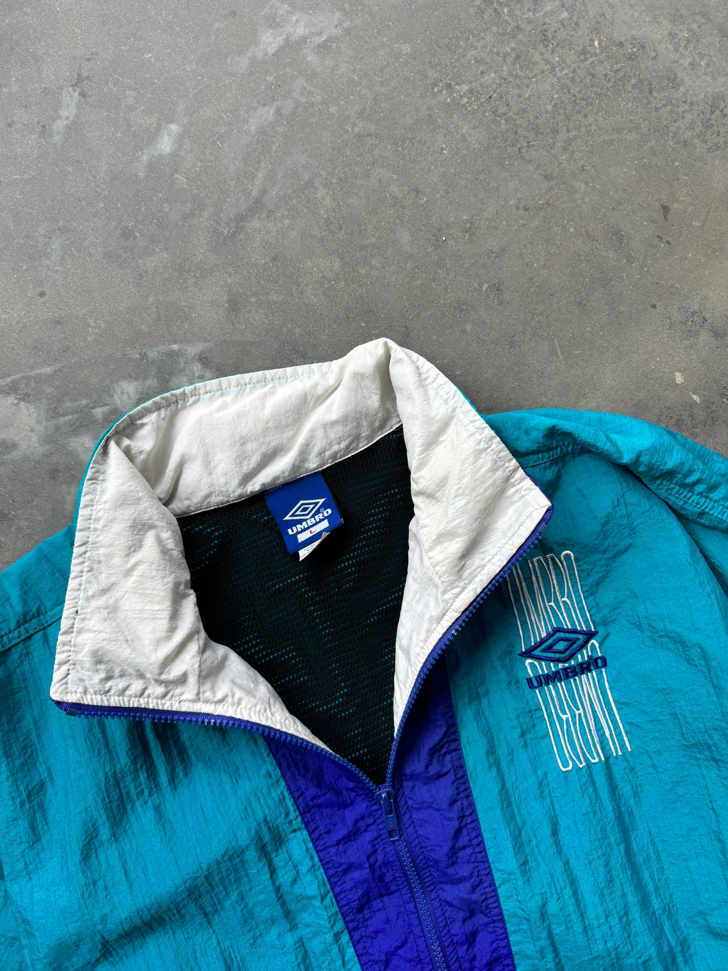 90’s Umbro Teal/Purple Half Zip Windbreaker Jacket (Large)