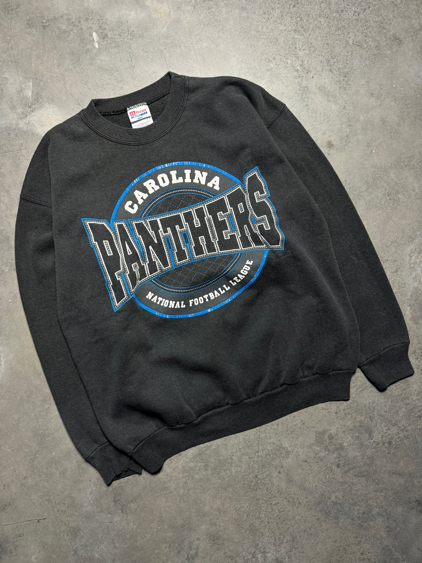 1996 Carolina Panthers Vintage Faded Black Sphere Spellout Logo NFL Crewneck (Large)