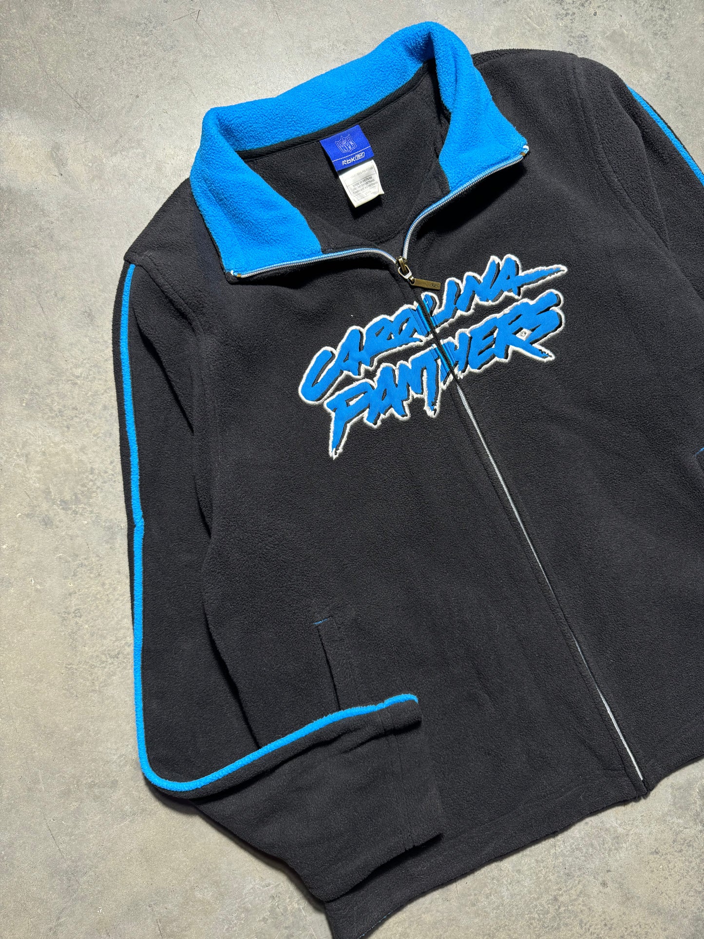 00’s Carolina Panthers Vintage Black Reebok Fleece Cat Scratch Font Embroidered Spellout Zip Up NFL Jacket (Women’s Large)