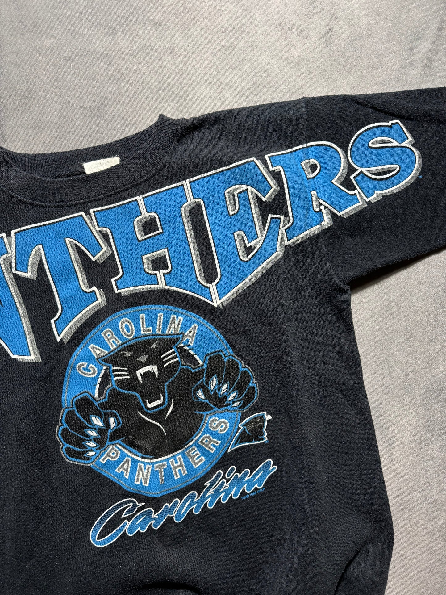 90’s Carolina Panthers Vintage Black Leaping Panther Full Shoulder to Shoulder Spellout NFL Crewneck (Small)