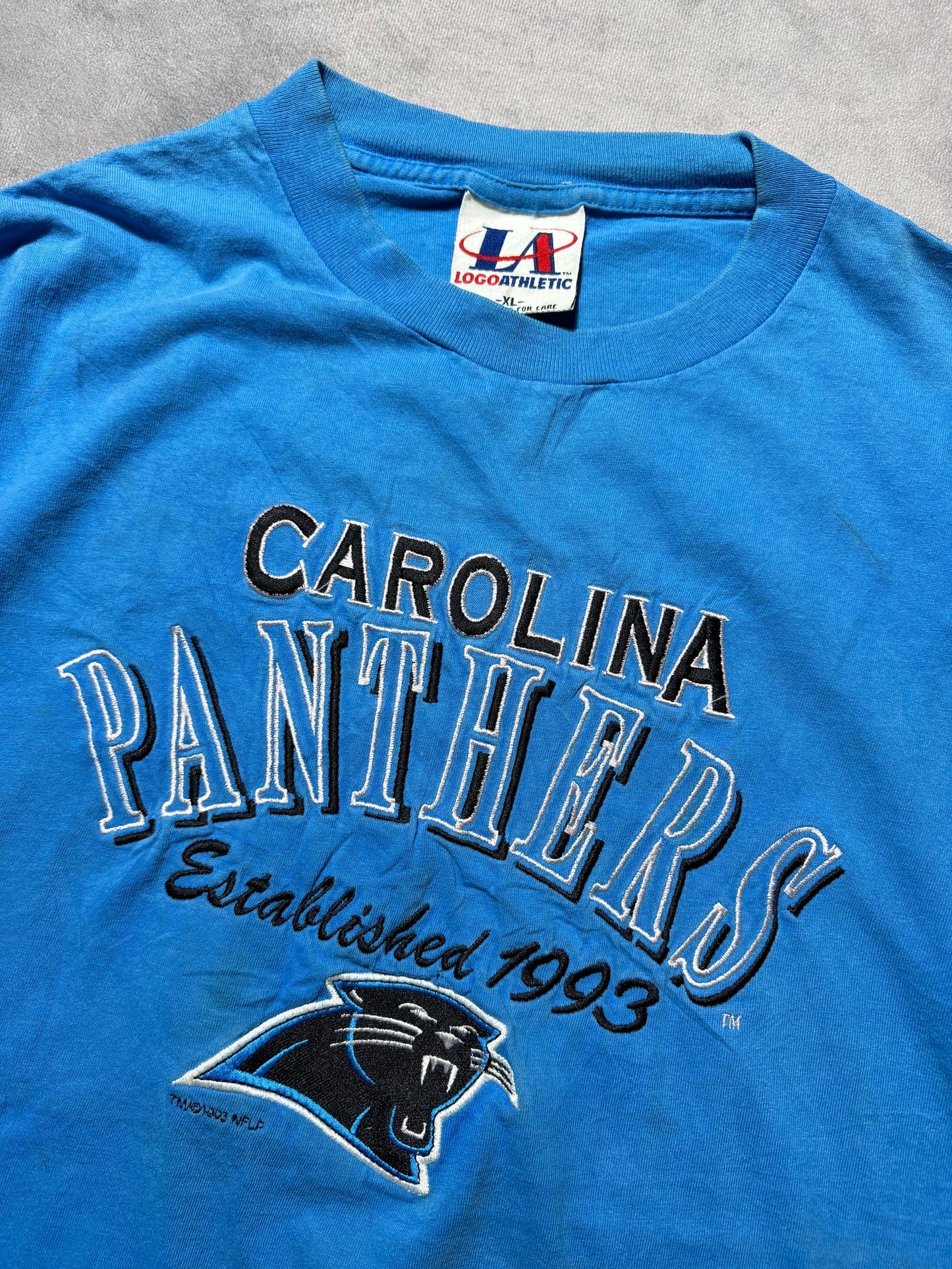 1993 Carolina Panthers Vintage Blue Logo Athletic Embroidered Spellout NFL Tee (XL)