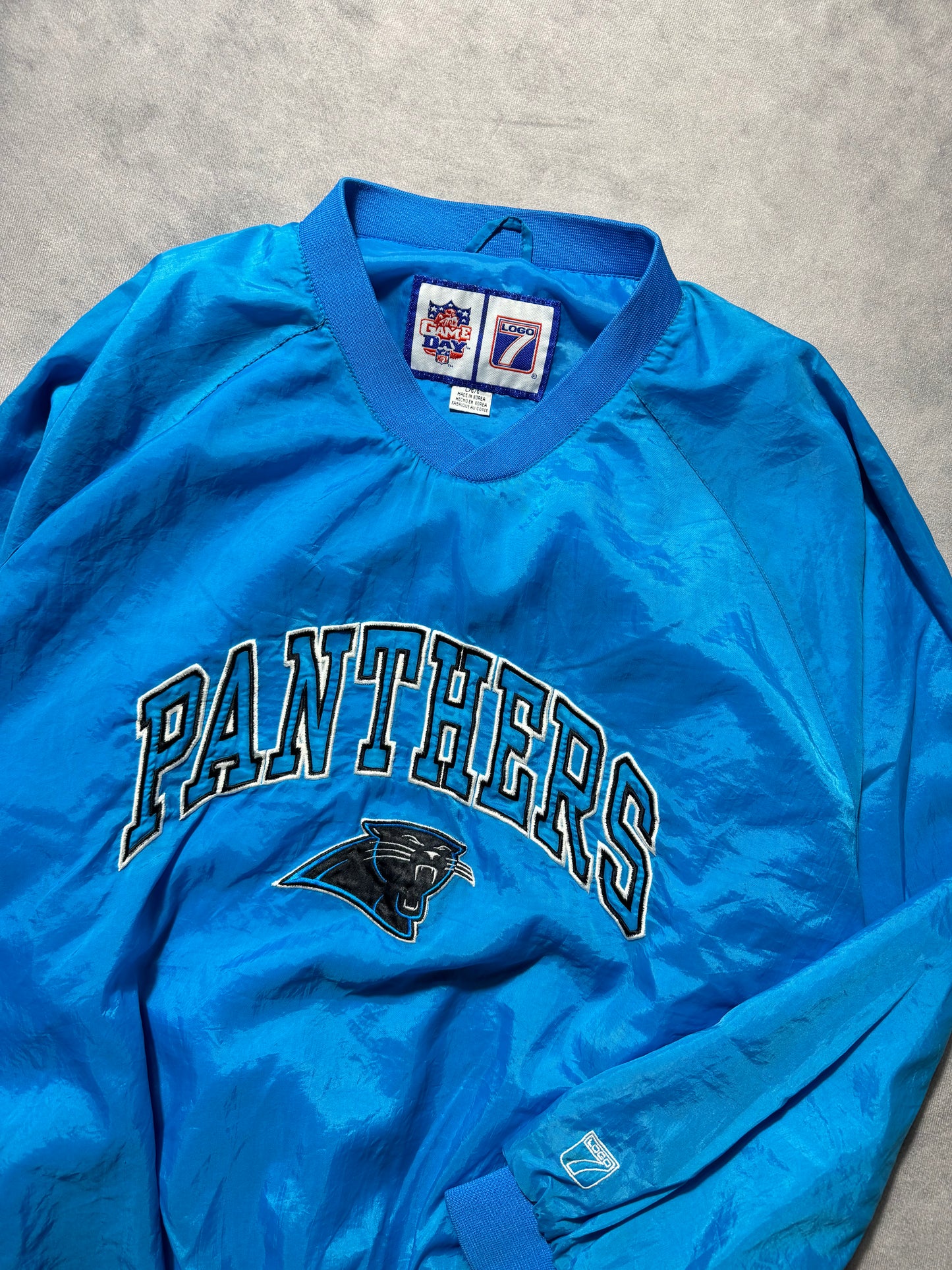 90’s Carolina Panthers Vintage Blue Logo 7 Embroidered Sideline Style NFL Windbreaker Pullover Jacket (Large)