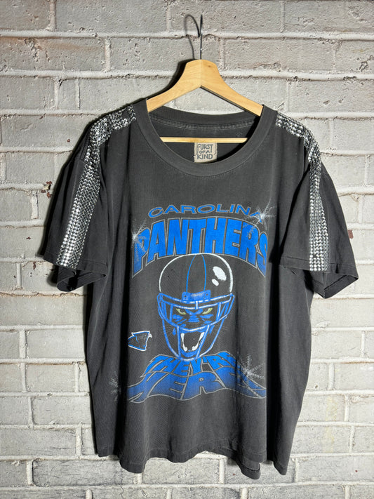 1993 Carolina Panthers Vintage Black “They’re Here!” Bedazzled Franchise Announcement NFL Tee (XL)