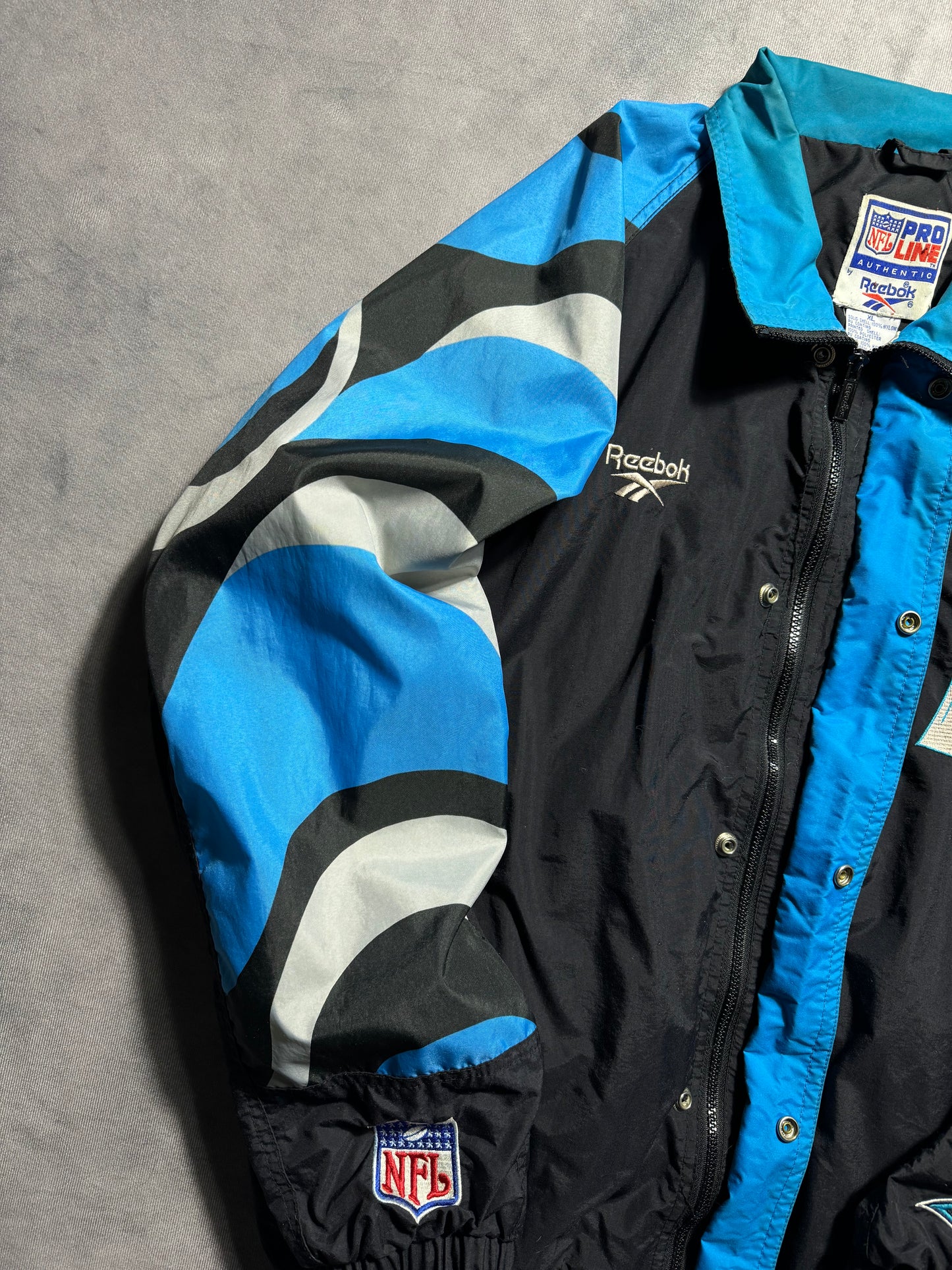 1995 Carolina Panthers Vintage Reebok Big Logo Multi Logo NFL Pro Line Sideline NFL Windbreaker Jacket (XL)