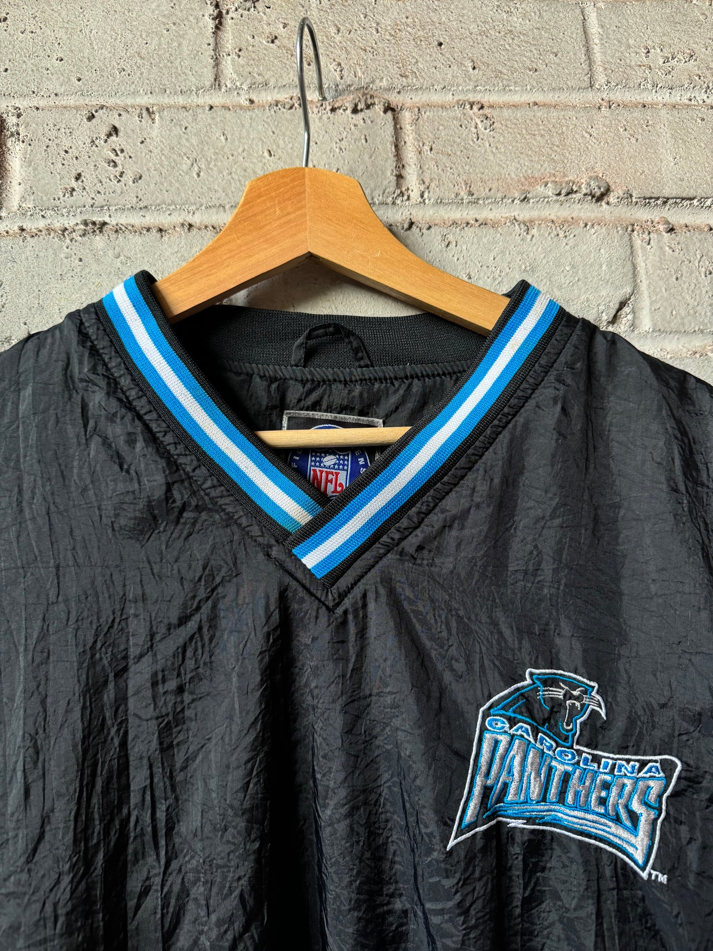 90’s Carolina Panthers Vintage Black Sleeve Striped NFL Windbreaker Pullover (Medium)
