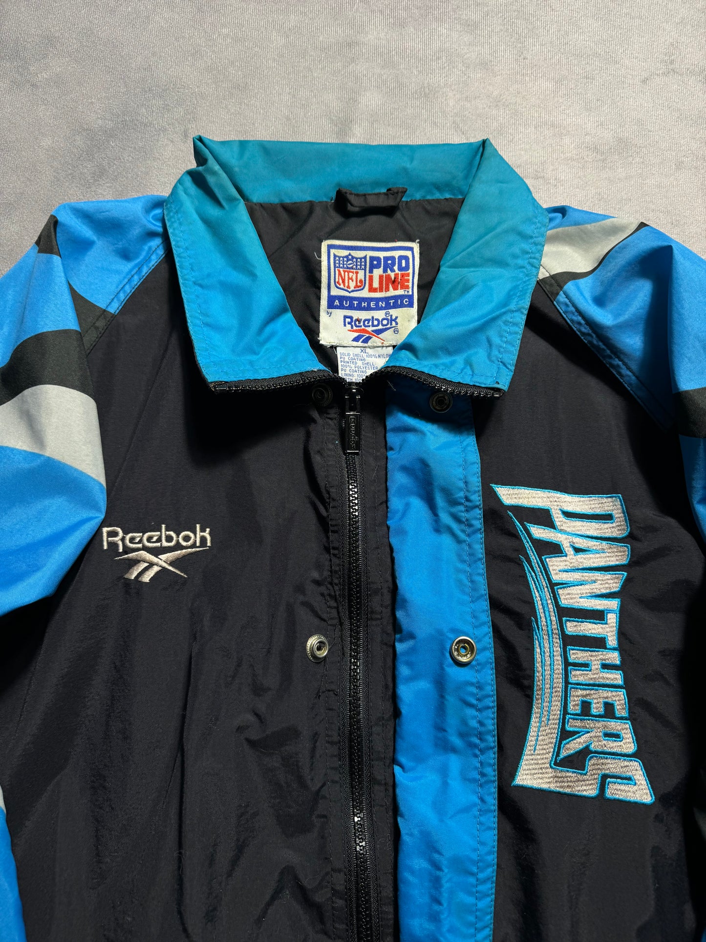 1995 Carolina Panthers Vintage Reebok Big Logo Multi Logo NFL Pro Line Sideline NFL Windbreaker Jacket (XL)