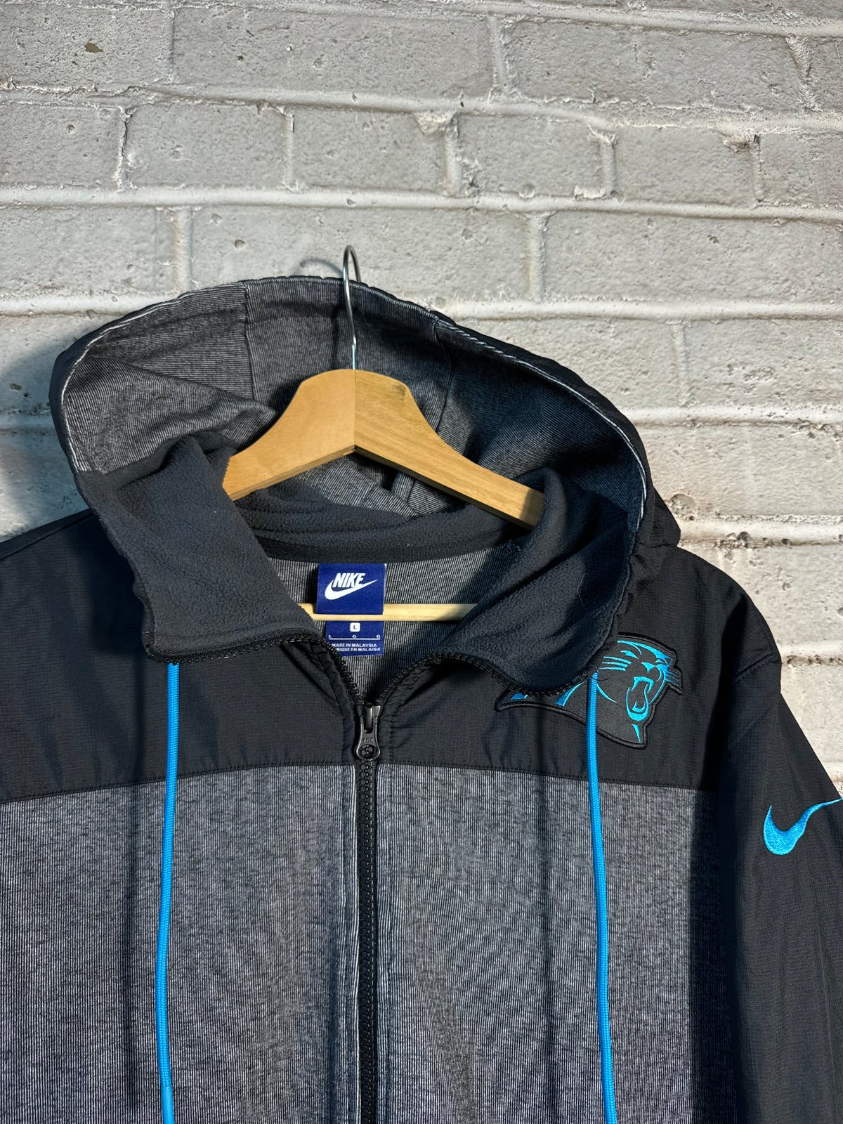 2017 Carolina Panthers Black/Dark Grey Nike Full Zip NFL Back Spellout Jacket (Large)