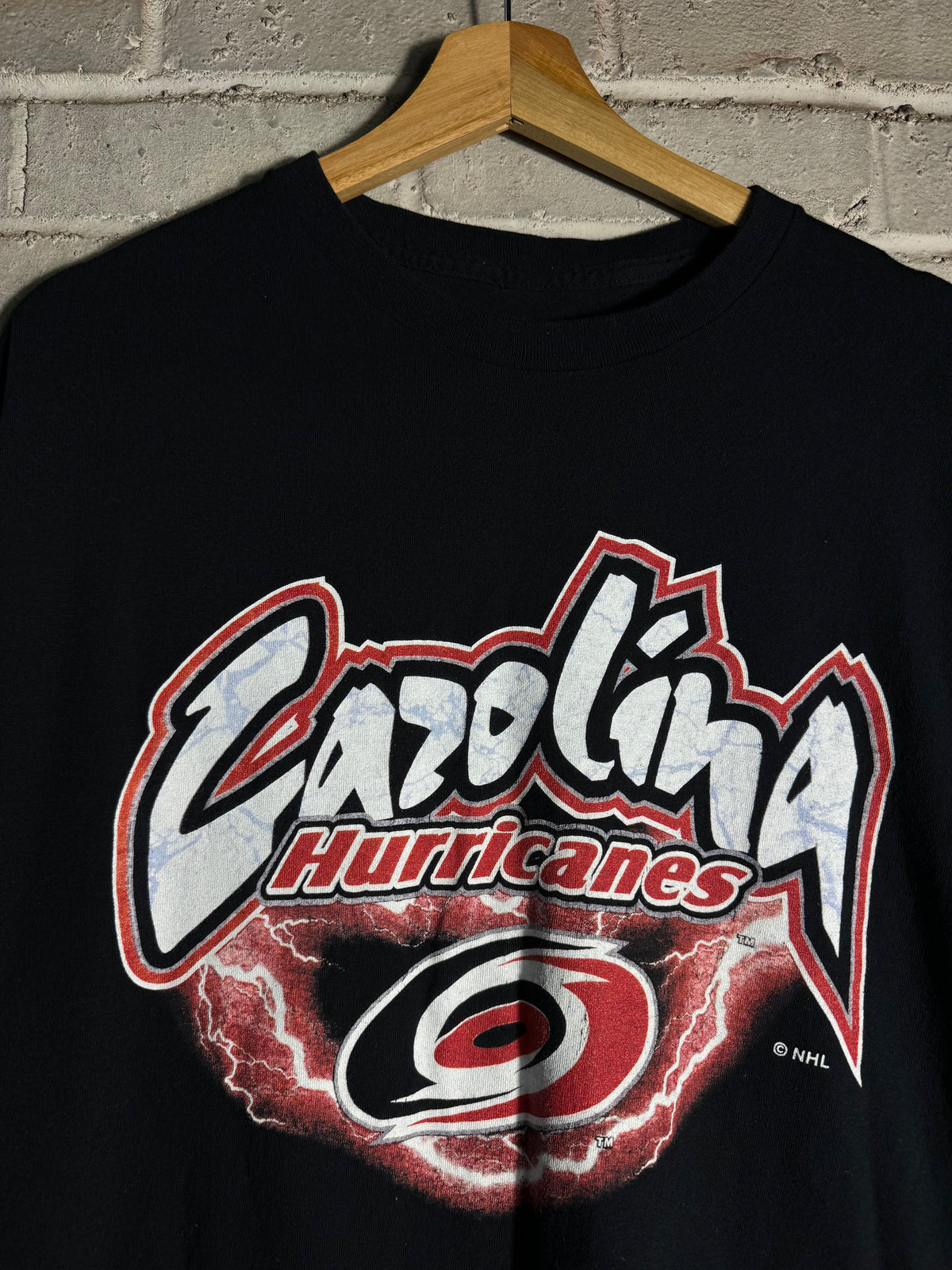 90’s Carolina Hurricanes Vintage Black Lightning Print NHL Hockey Tee (Medium)