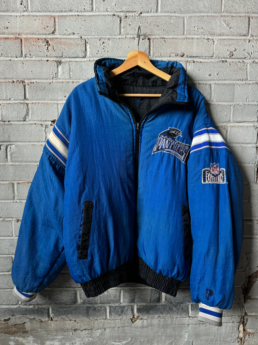 90’s Carolina Panthers Vintage Pro Player Multi Logo Ribbed Shoulder Reversible NFL Puffer Jacket (Large)