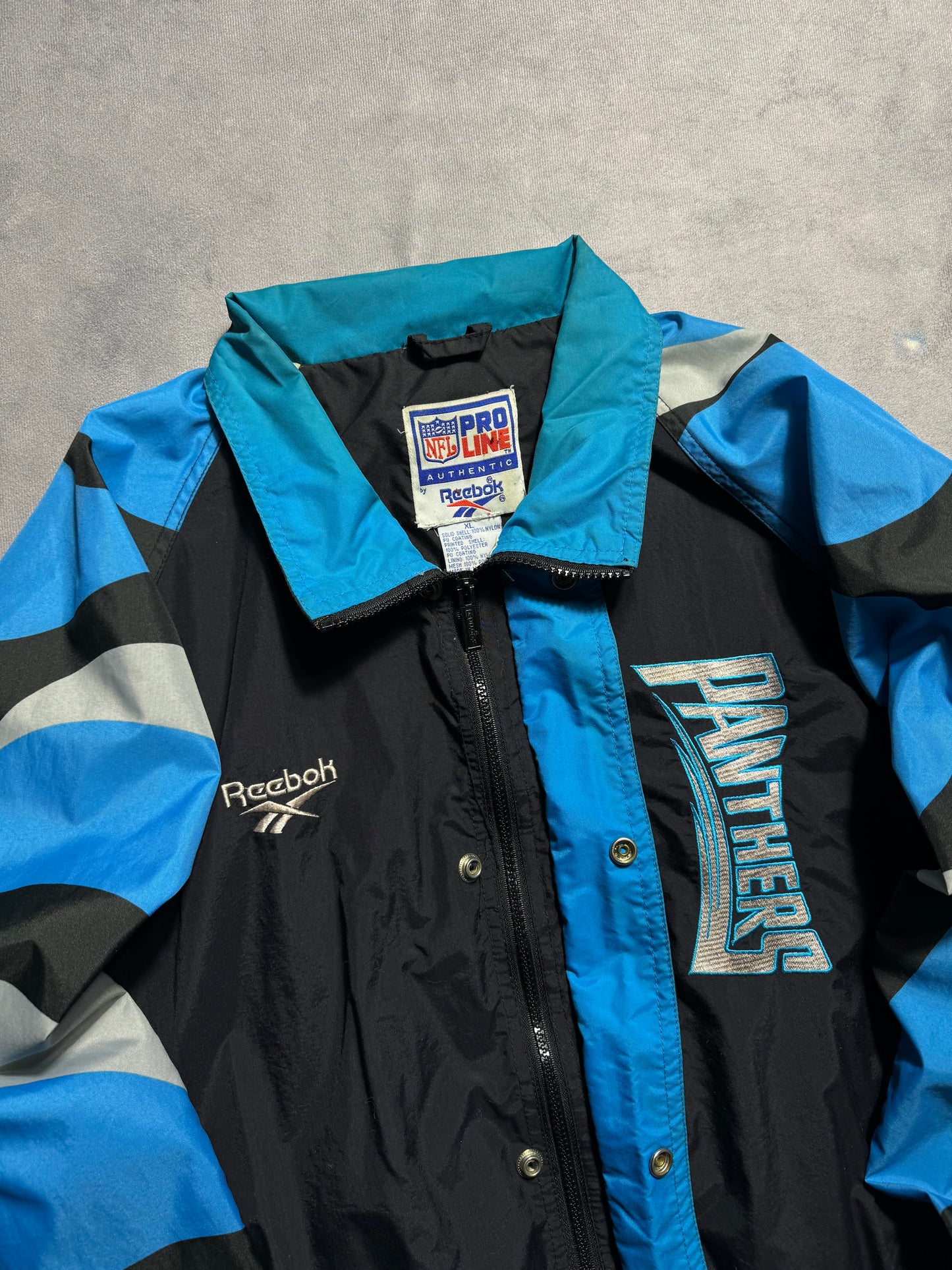 1995 Carolina Panthers Vintage Reebok Big Logo Multi Logo NFL Pro Line Sideline NFL Windbreaker Jacket (XL)