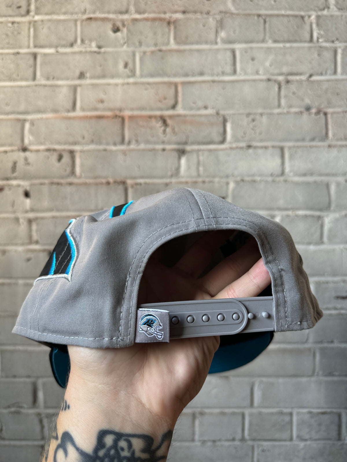 2024 Carolina Panthers New Era Helmet Style NFL Snapback Hat (OSFA)