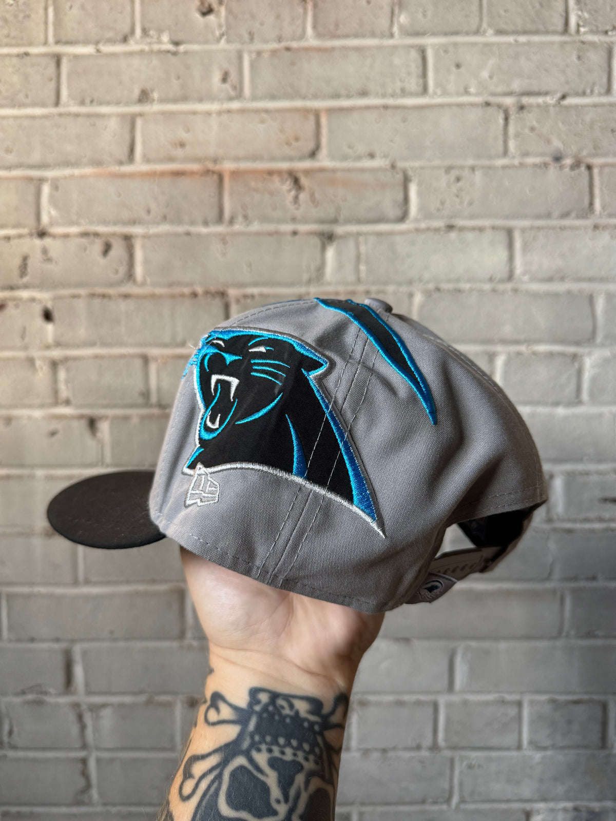 2024 Carolina Panthers New Era Helmet Style NFL Snapback Hat (OSFA)