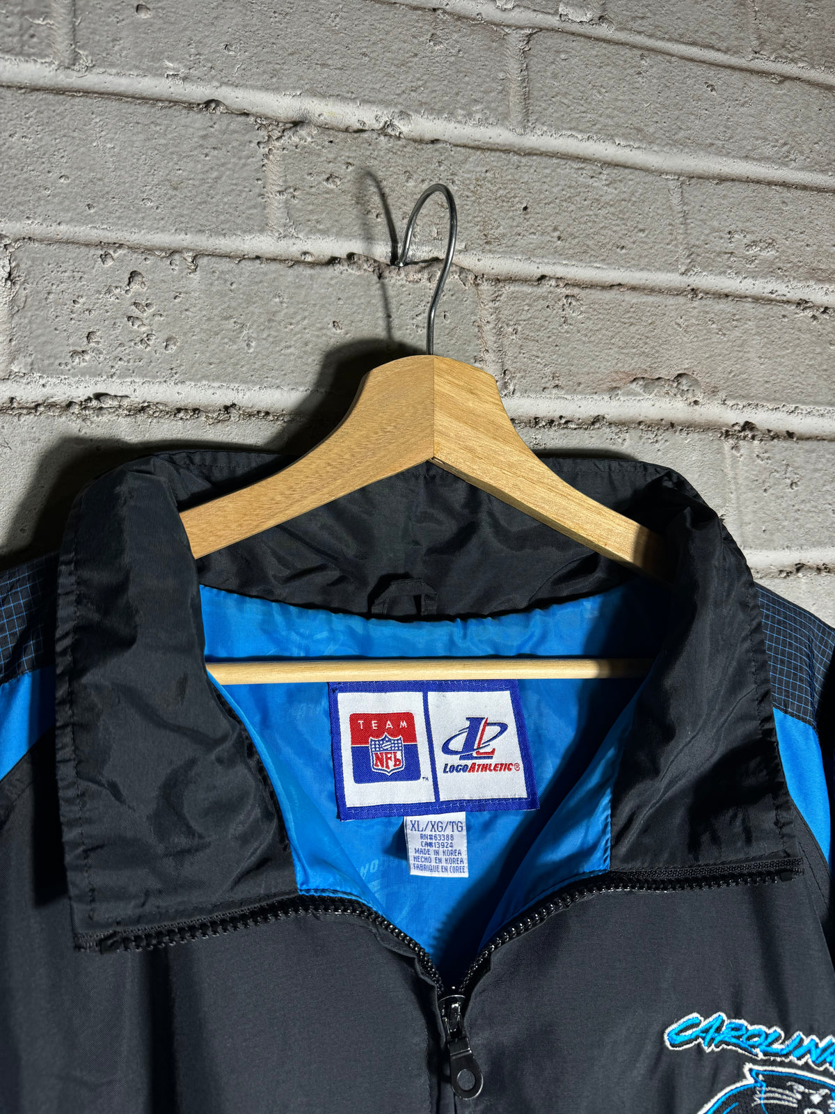 90’s Carolina Panthers Vintage Black Blue Logo Athletic Cat Scratch Font Full Zip Windbreaker Jacket (XL)