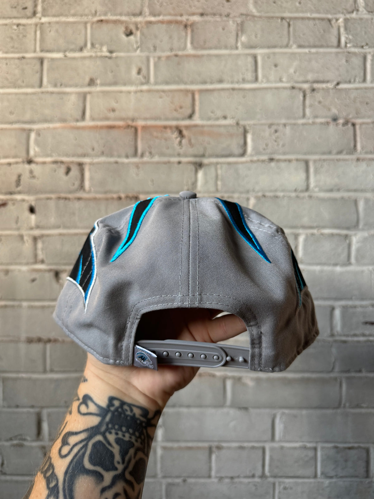 2024 Carolina Panthers New Era Helmet Style NFL Snapback Hat (OSFA)