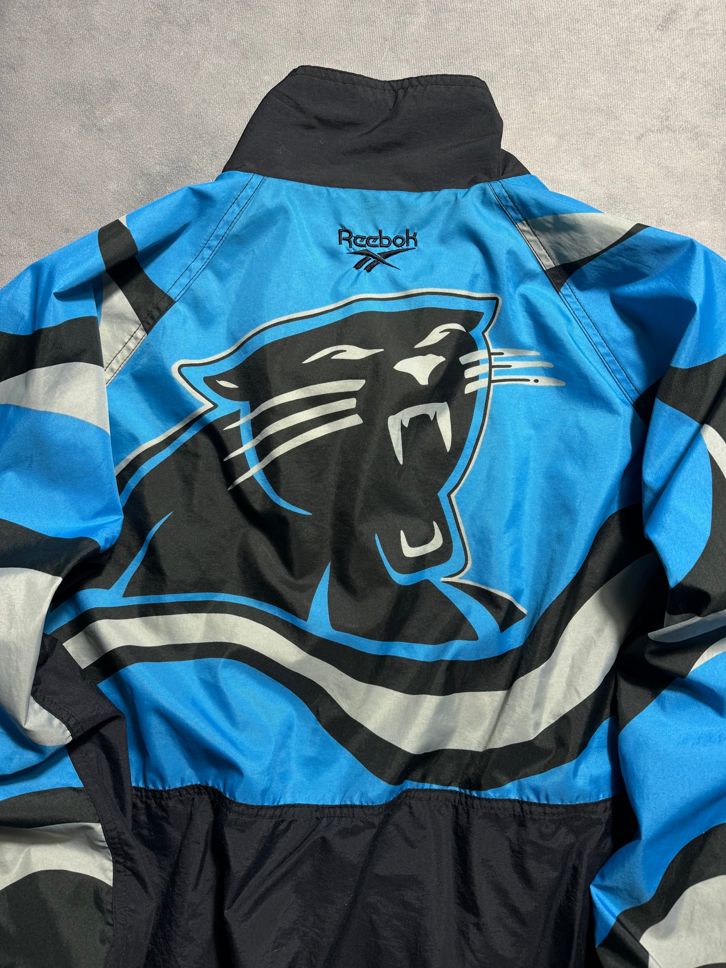 1995 Carolina Panthers Vintage Reebok Big Logo Multi Logo NFL Pro Line Sideline NFL Windbreaker Jacket (XL)