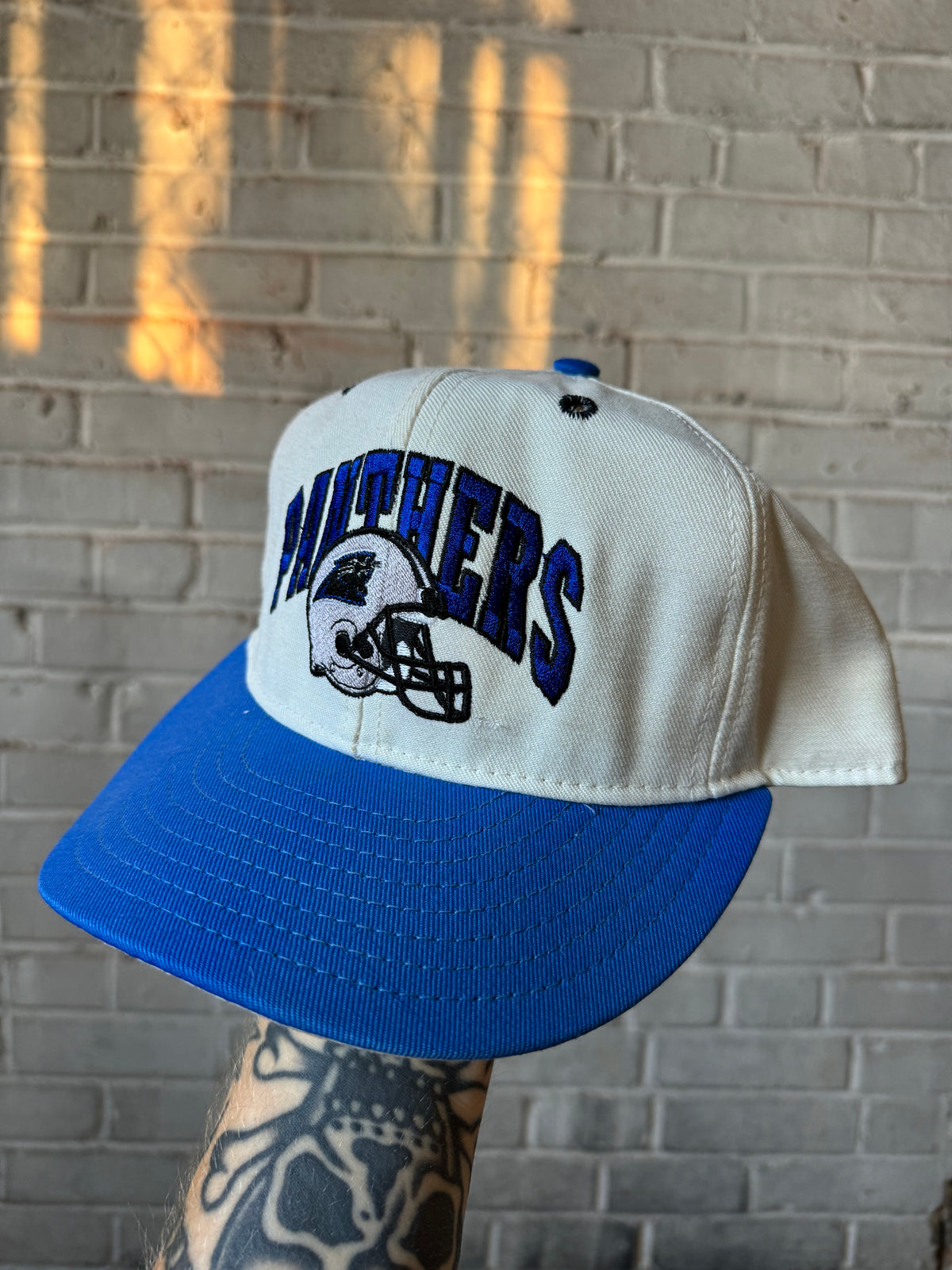 90’s Carolina Panthers Vintage Cream/Blue Arch Helmet Spellout NFL Snapback Hat (OSFA)