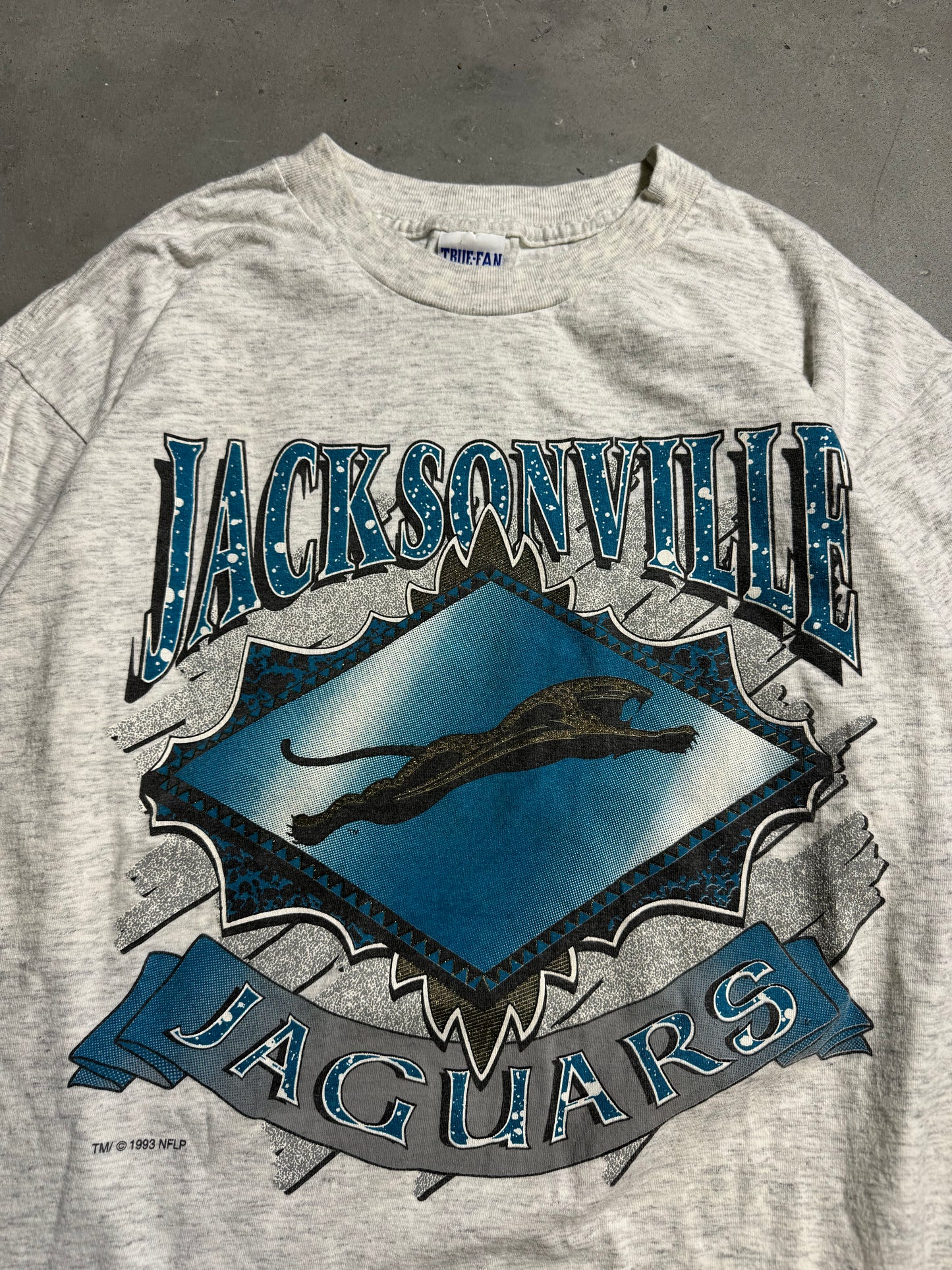 1993 Jacksonville Jaguars Vintage Heather Grey Banned Logo NFL Spellout Big Logo Tee (Large)