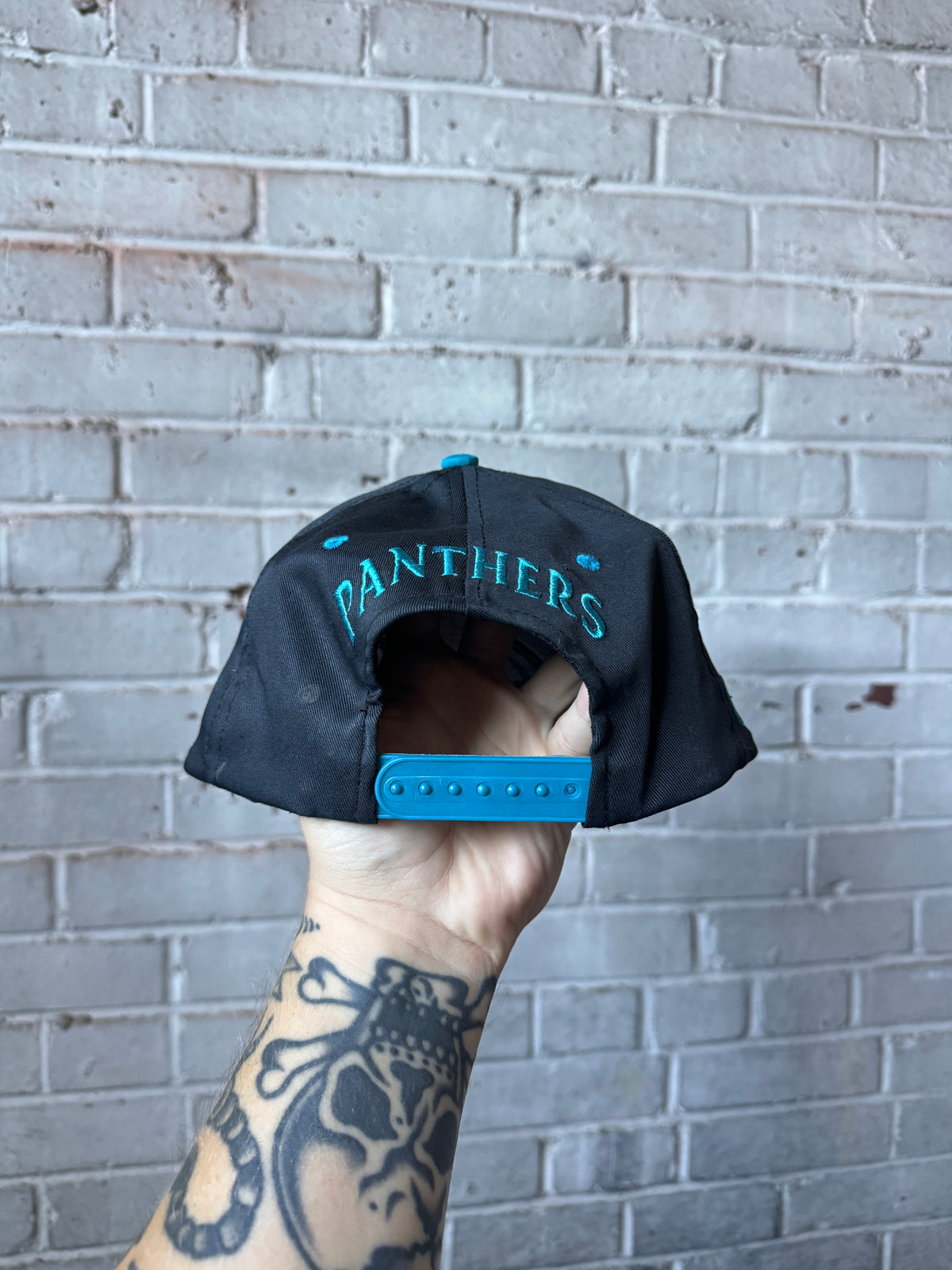90’s Carolina Panthers Vintage Black Blue Back Spellout NFL Snapback Hat (OSFA)