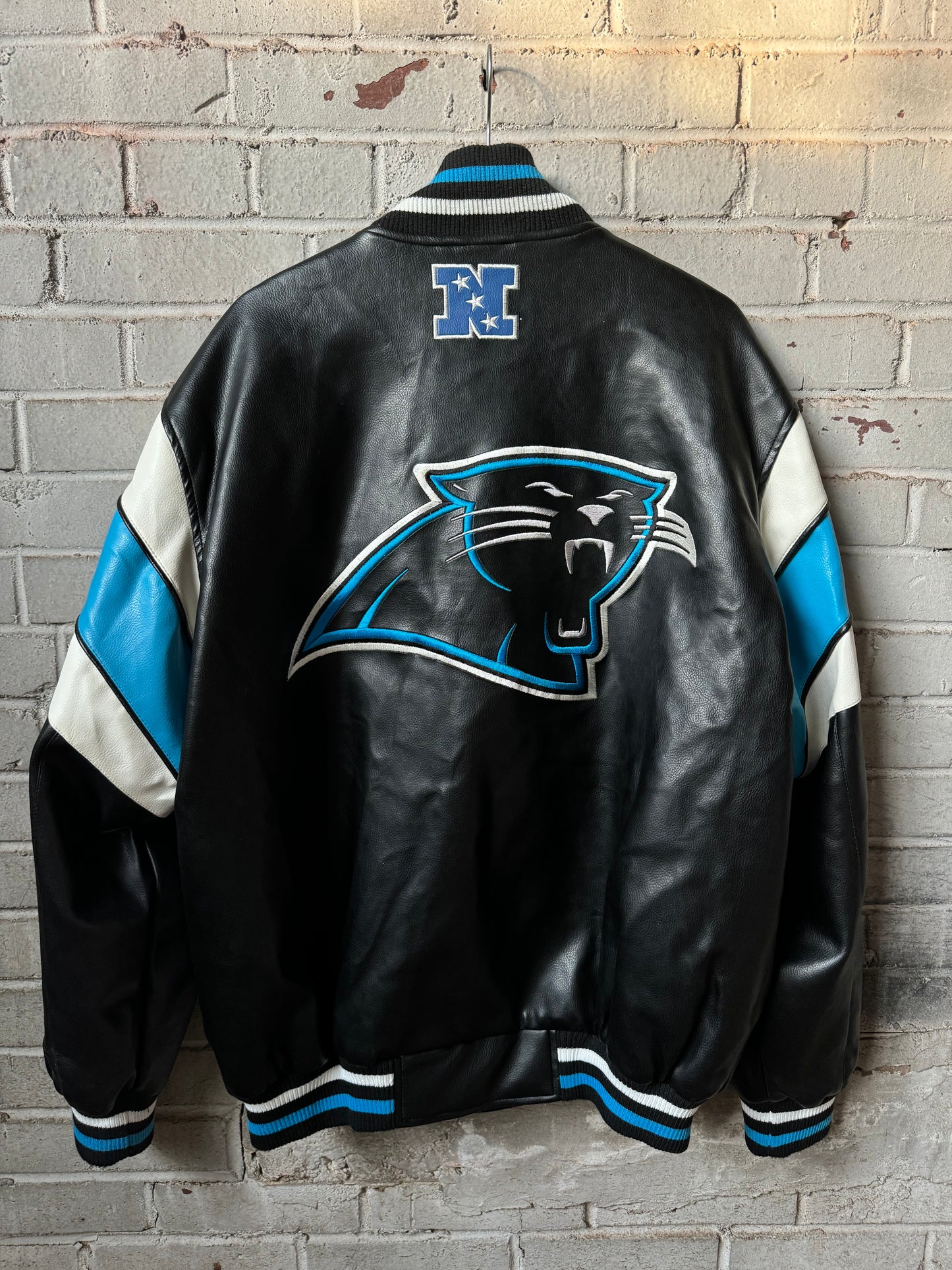 00’s Carolina Panthers Vintage Cat Scratch Font Big Logo Shoulder Striped NFL Leather Jacket (XL)