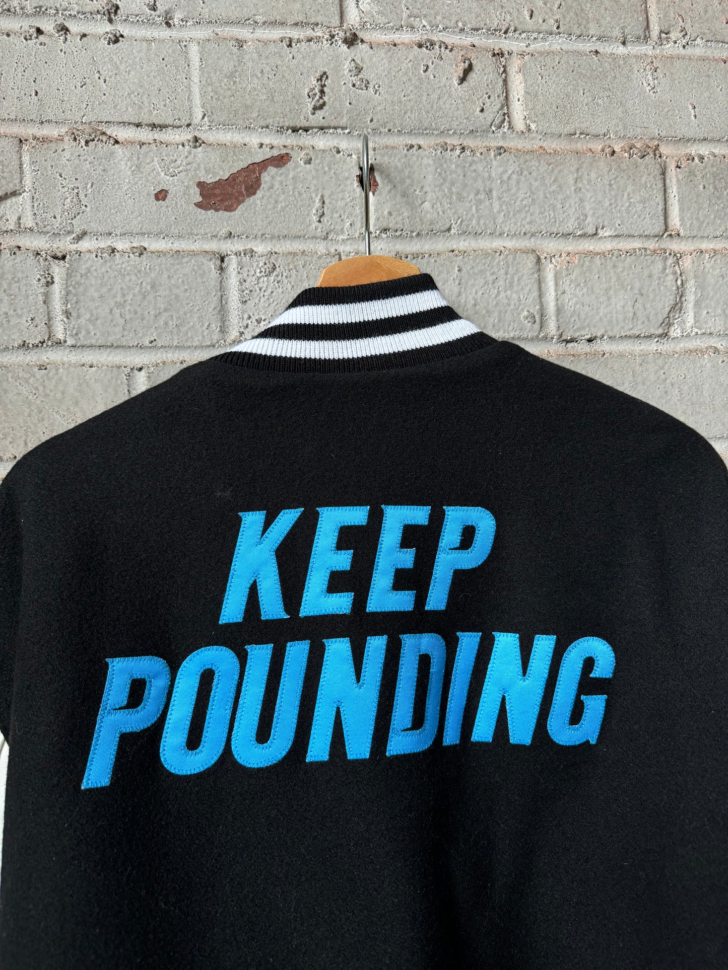Carolina Panthers Black Keep Pounding Holloway Heavyweight Leather NFL Varsity Jacket (Large)