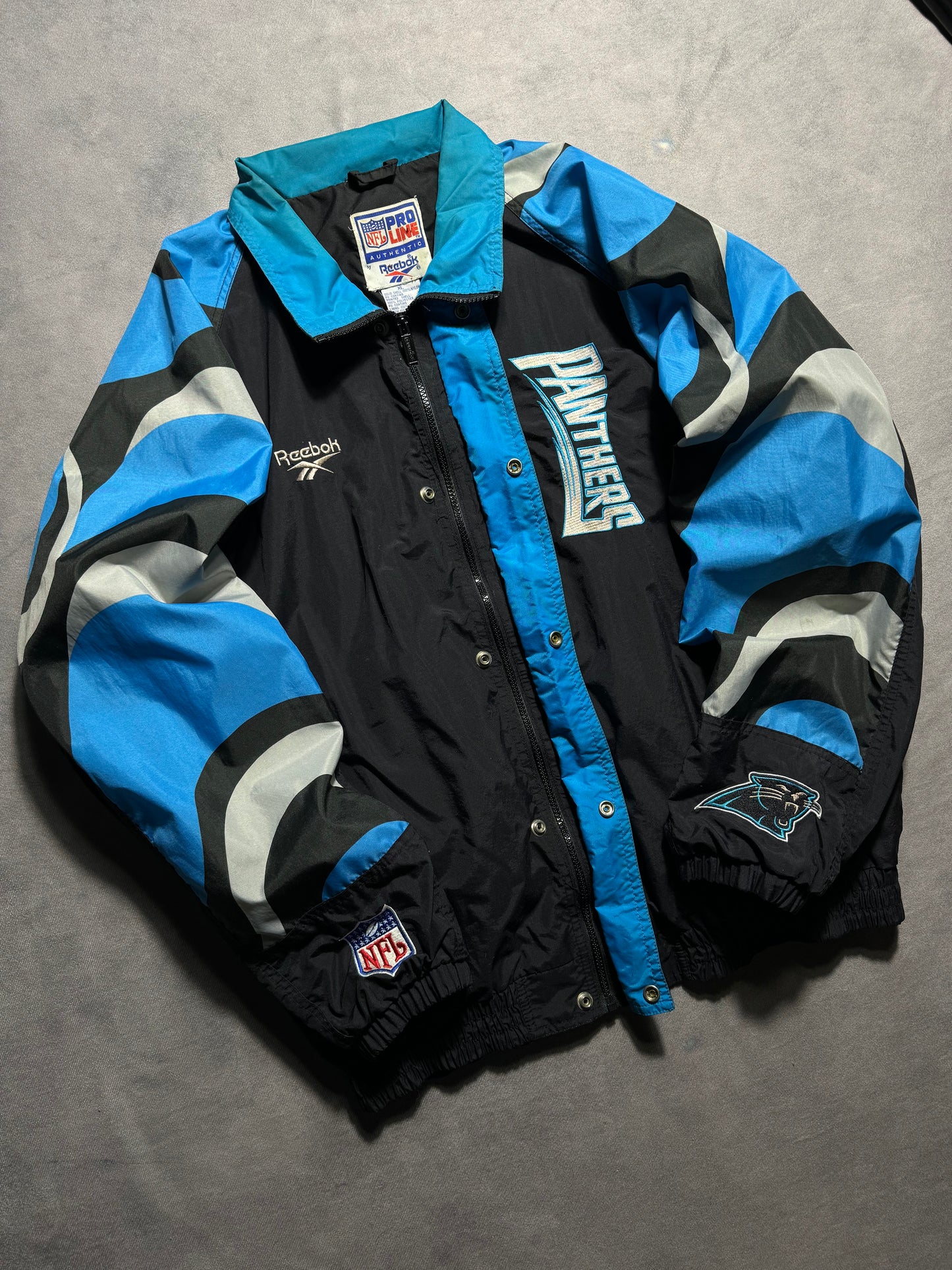 1995 Carolina Panthers Vintage Reebok Big Logo Multi Logo NFL Pro Line Sideline NFL Windbreaker Jacket (XL)