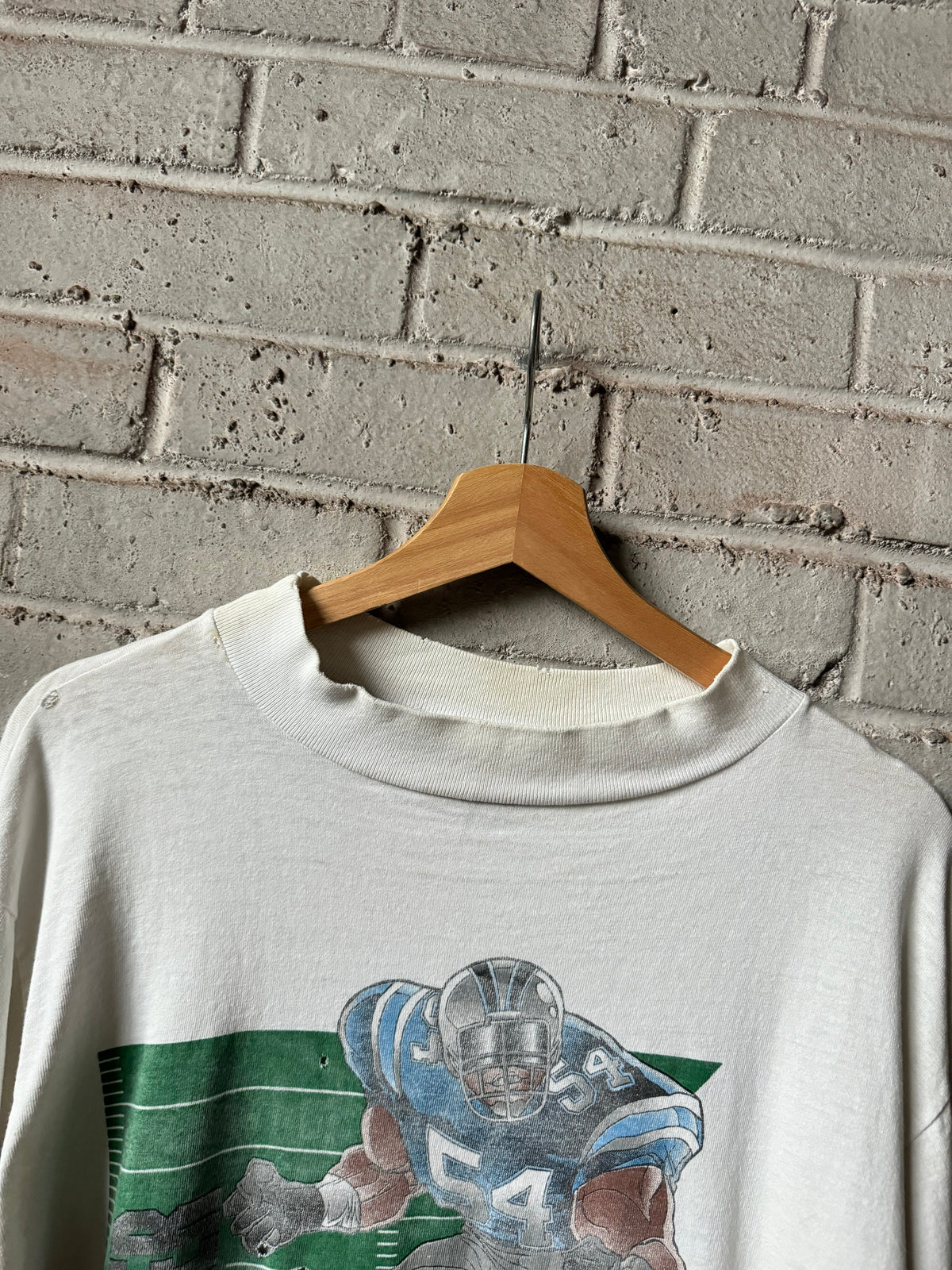 1996 Carolina Panthers Carlton Bailey Vintage White Distressed Cartoon Graphic NFL Mock Neck Longsleeve Tee (Large)