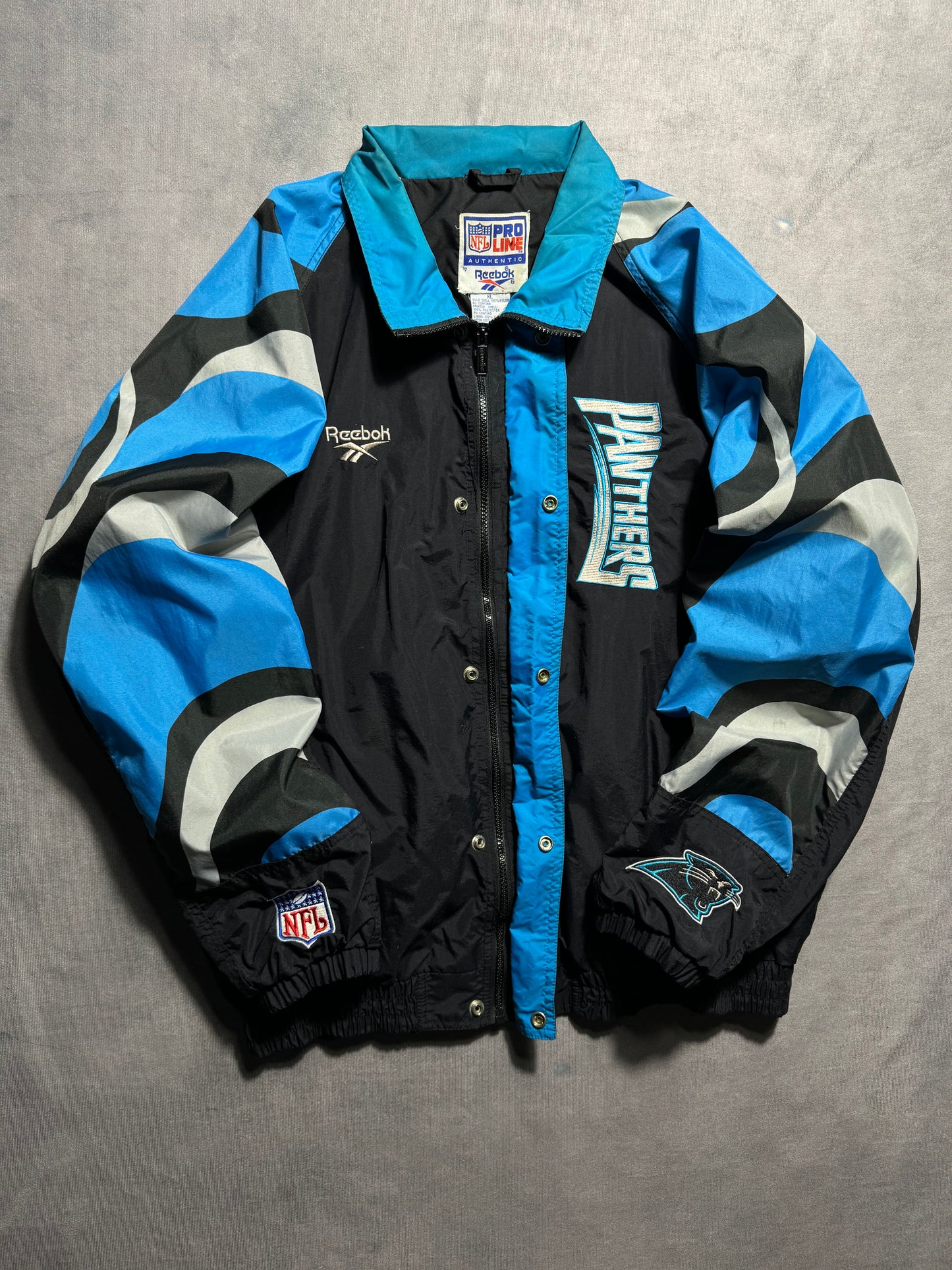 1995 Carolina Panthers Vintage Reebok Big Logo Multi Logo NFL Pro Line Sideline NFL Windbreaker Jacket (XL)