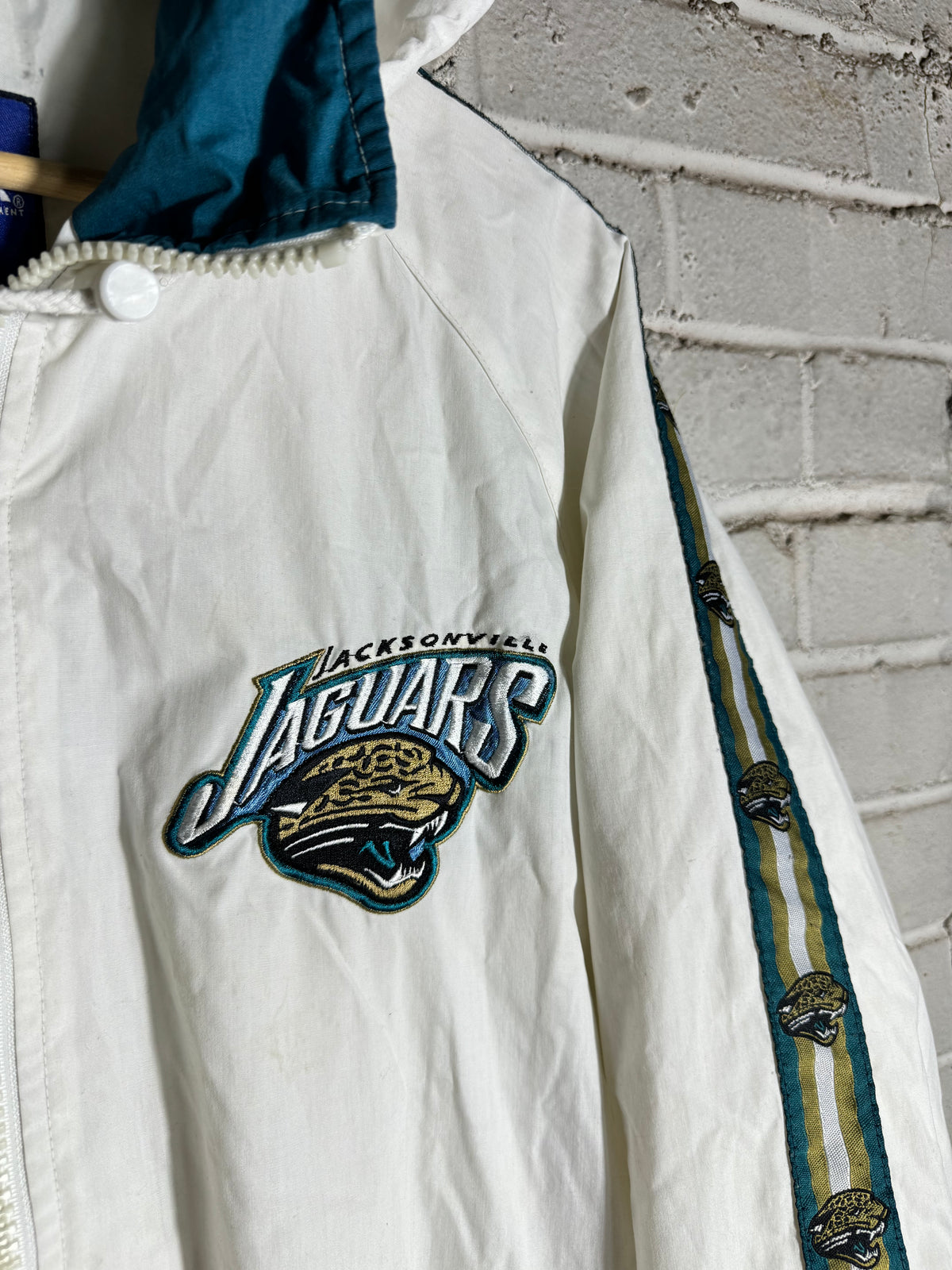90’s Jacksonville Jaguars Vintage White Repeat Logo Pro Player Full Zip NFL Windbreaker Jacket (Medium)