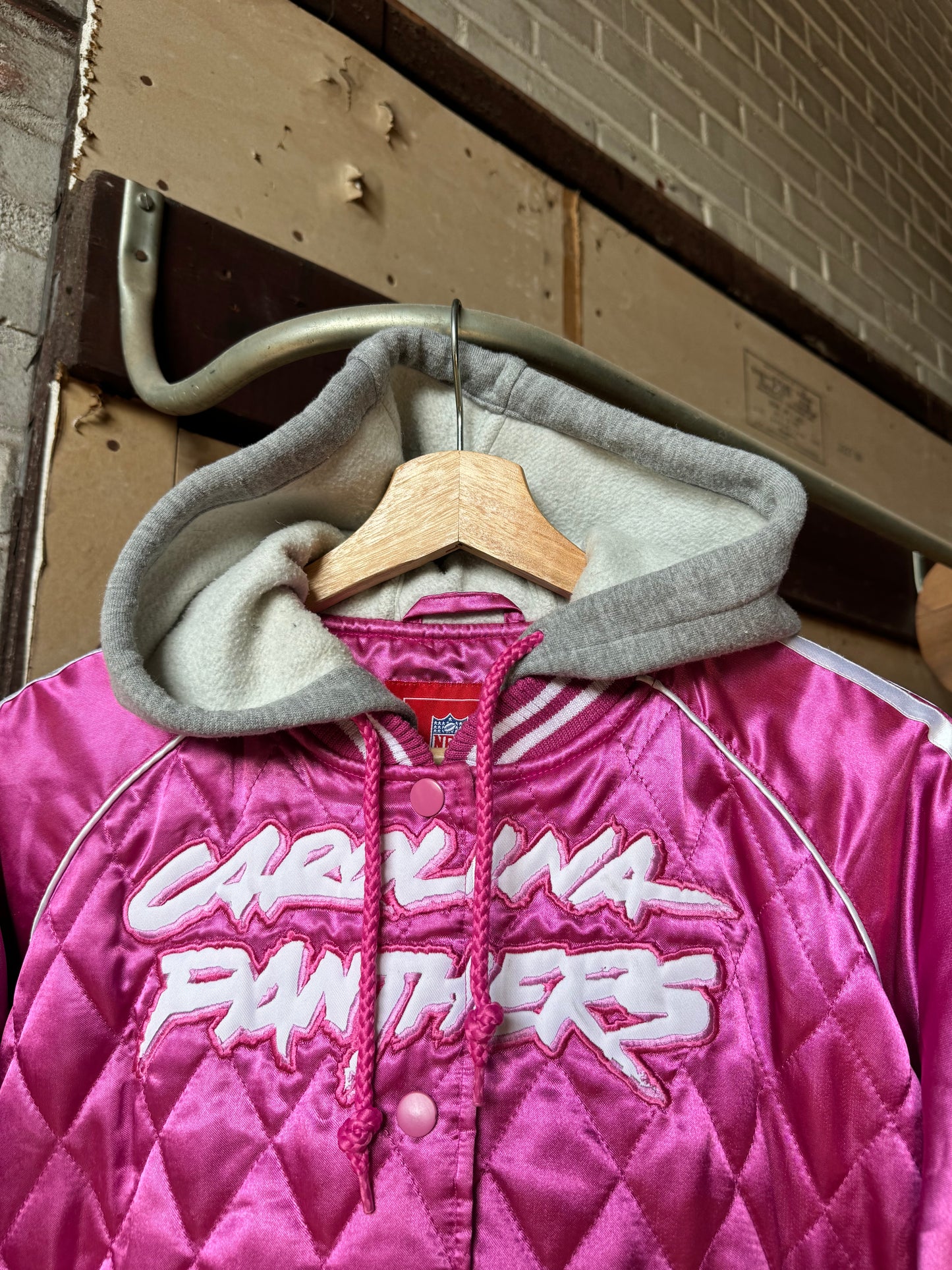 00’s Carolina Panthers Vintage Pink Quilted Cat Scratch Font Reebok NFL Hooded Satin Jacket (Women’s Large)