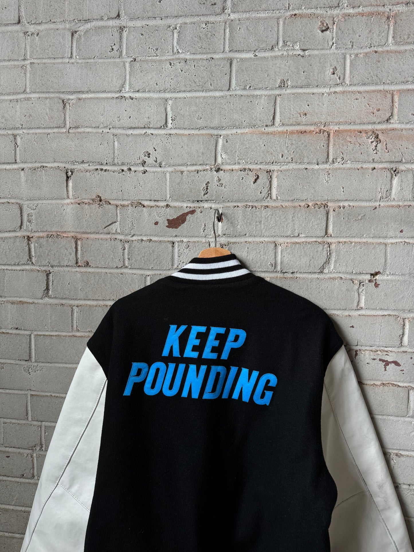 Carolina Panthers Black Keep Pounding Holloway Heavyweight Leather NFL Varsity Jacket (Large)