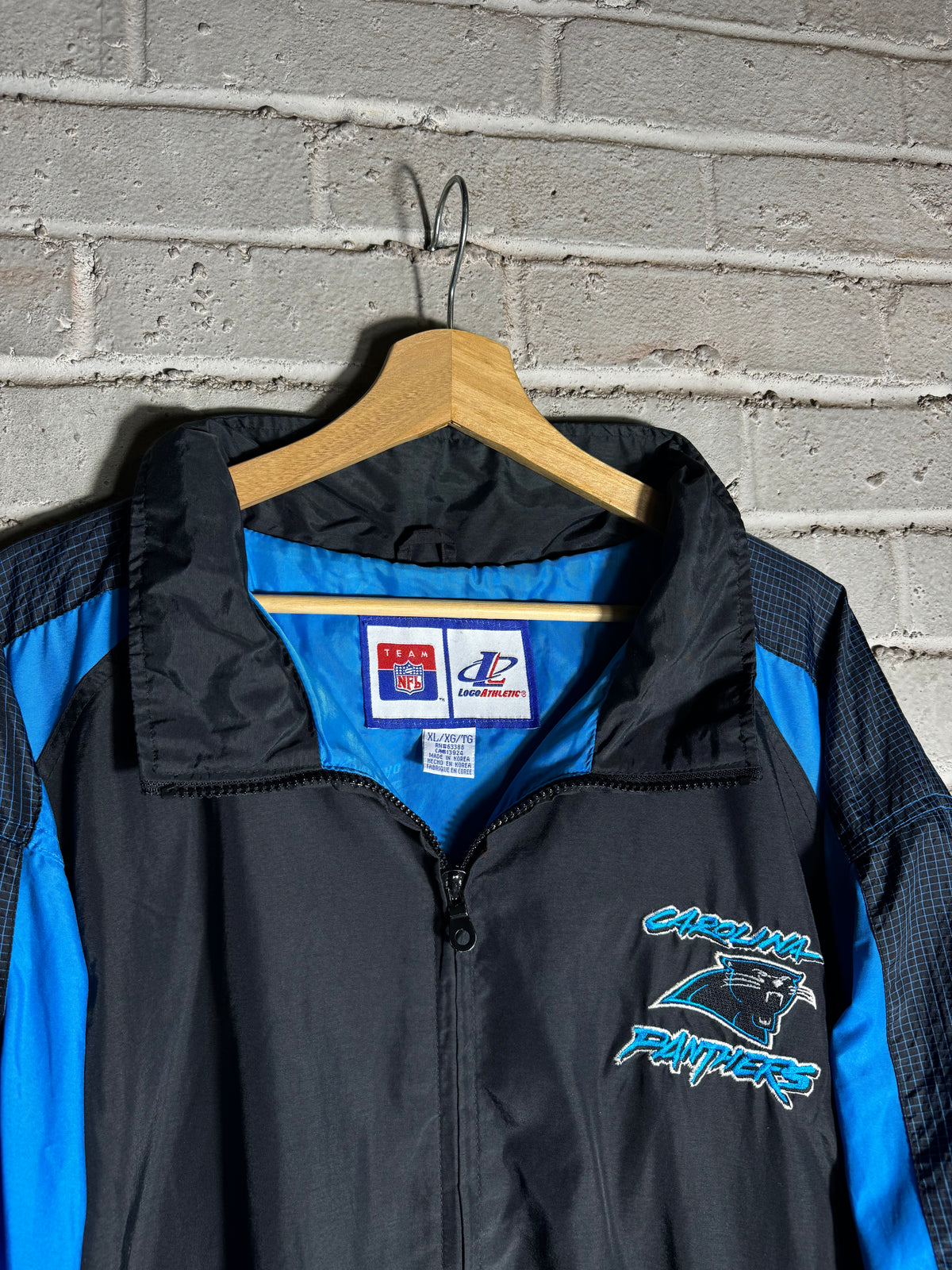 90’s Carolina Panthers Vintage Black Blue Logo Athletic Cat Scratch Font Full Zip Windbreaker Jacket (XL)