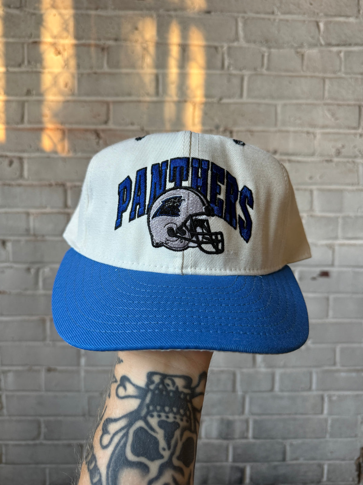 90’s Carolina Panthers Vintage Cream/Blue Arch Helmet Spellout NFL Snapback Hat (OSFA)