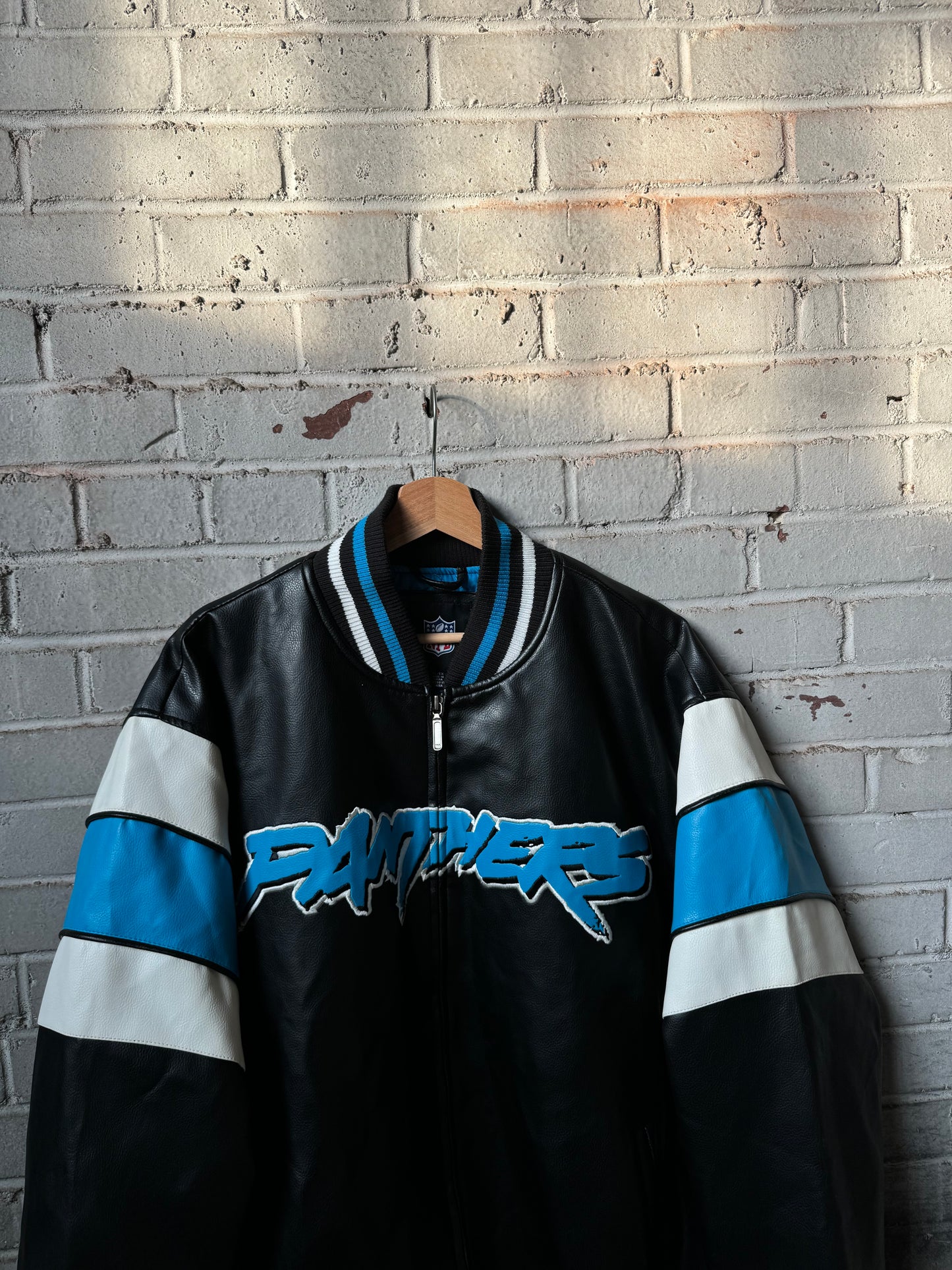00’s Carolina Panthers Vintage Cat Scratch Font Big Logo Shoulder Striped NFL Leather Jacket (XL)