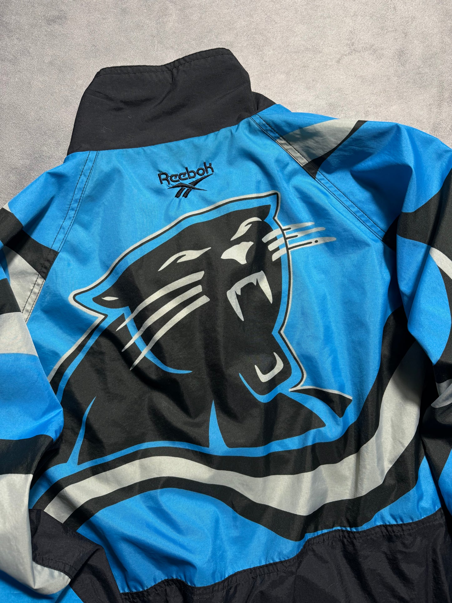 1995 Carolina Panthers Vintage Reebok Big Logo Multi Logo NFL Pro Line Sideline NFL Windbreaker Jacket (XL)