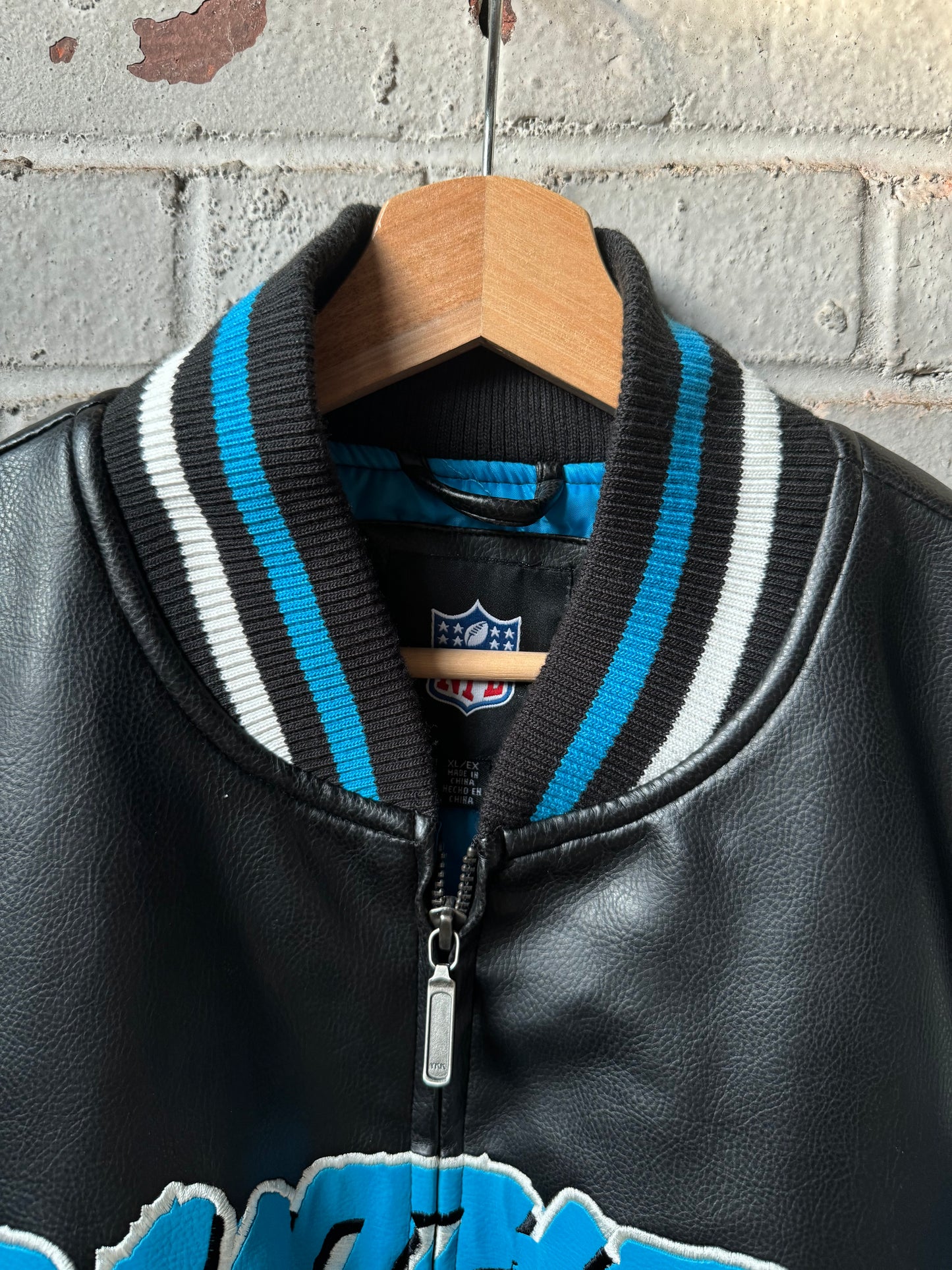 00’s Carolina Panthers Vintage Cat Scratch Font Big Logo Shoulder Striped NFL Leather Jacket (XL)