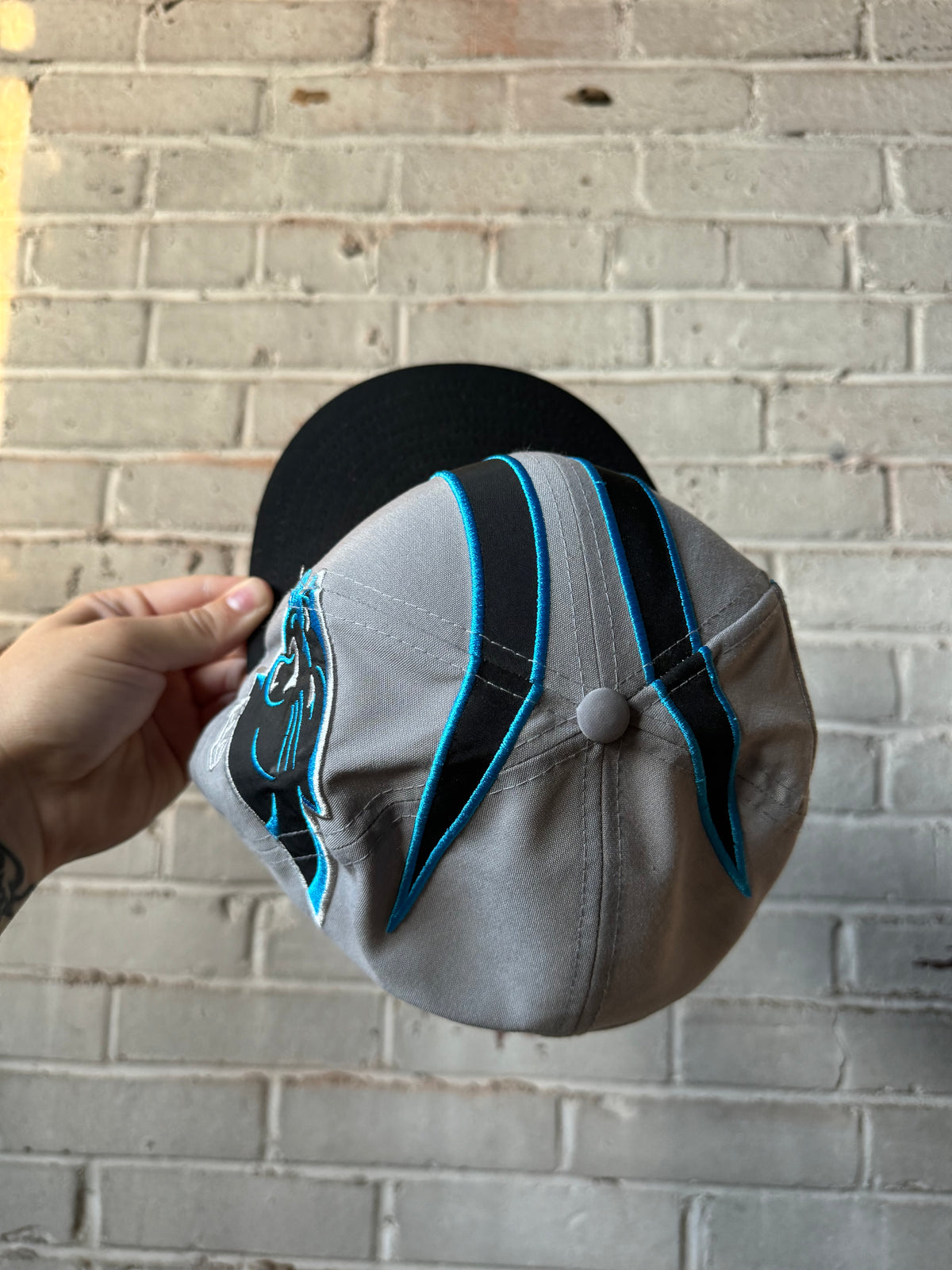2024 Carolina Panthers New Era Helmet Style NFL Snapback Hat (OSFA)