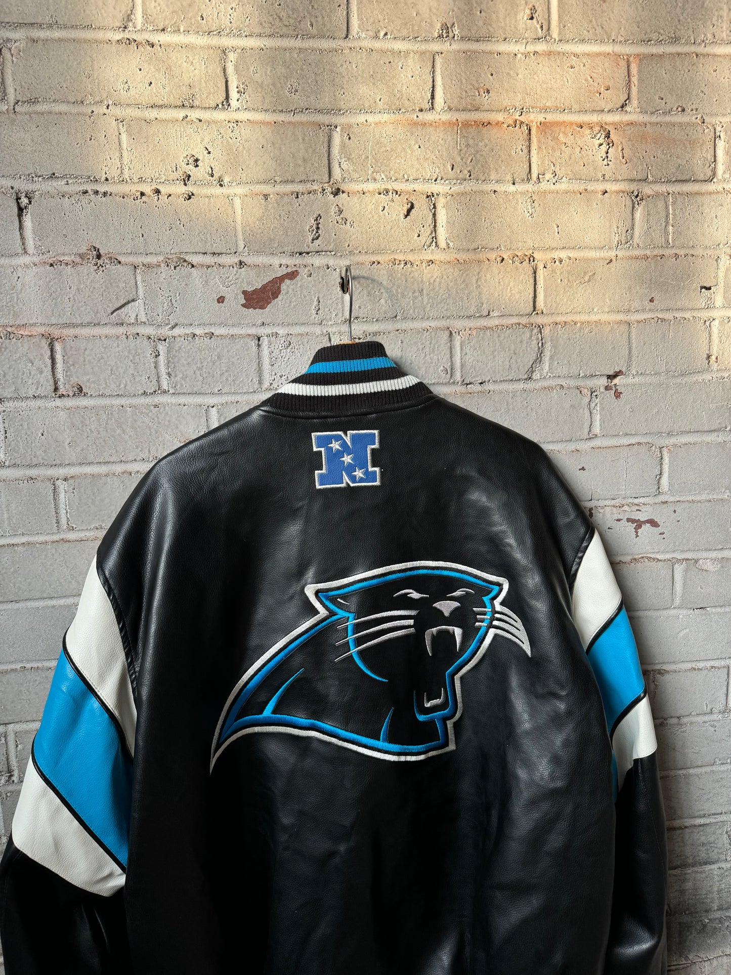 00’s Carolina Panthers Vintage Cat Scratch Font Big Logo Shoulder Striped NFL Leather Jacket (XL)