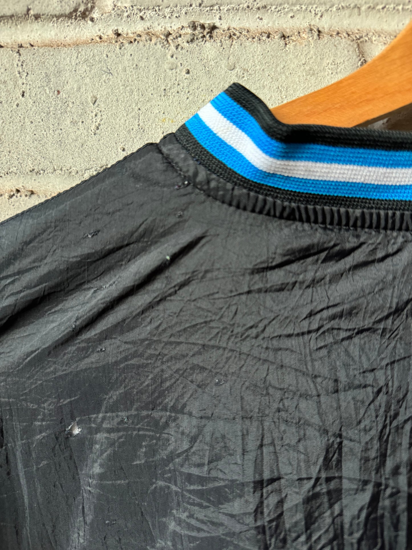 90’s Carolina Panthers Vintage Black Sleeve Striped NFL Windbreaker Pullover (Medium)