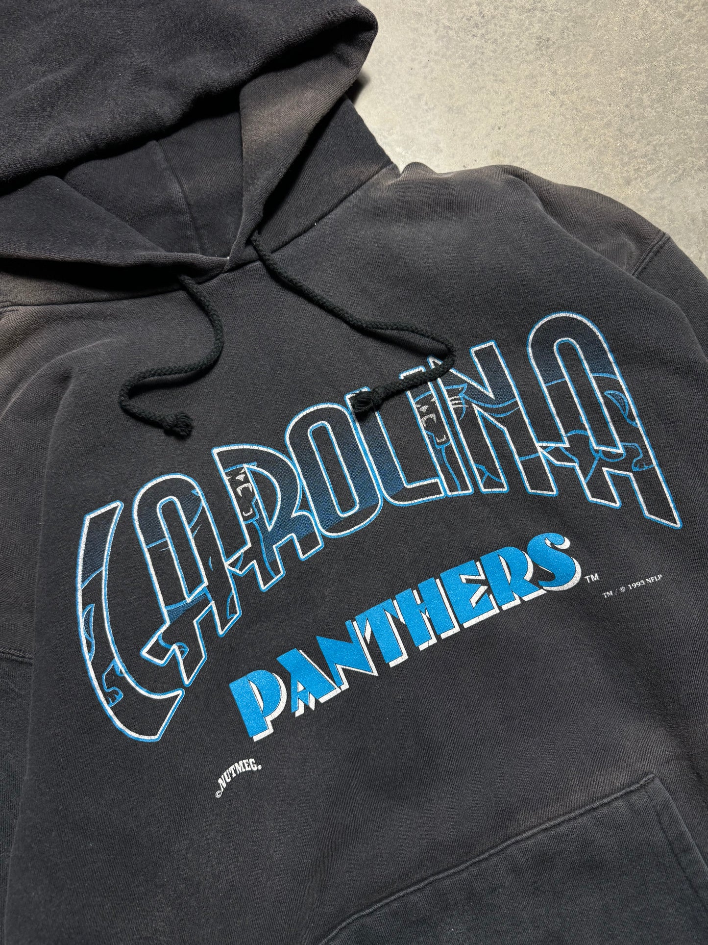 1993 Carolina Panthers Vintage Black Sun Faded Nutmeg Mills Full Alternate Cat Logo Spellout NFL Hoodie (Large)
