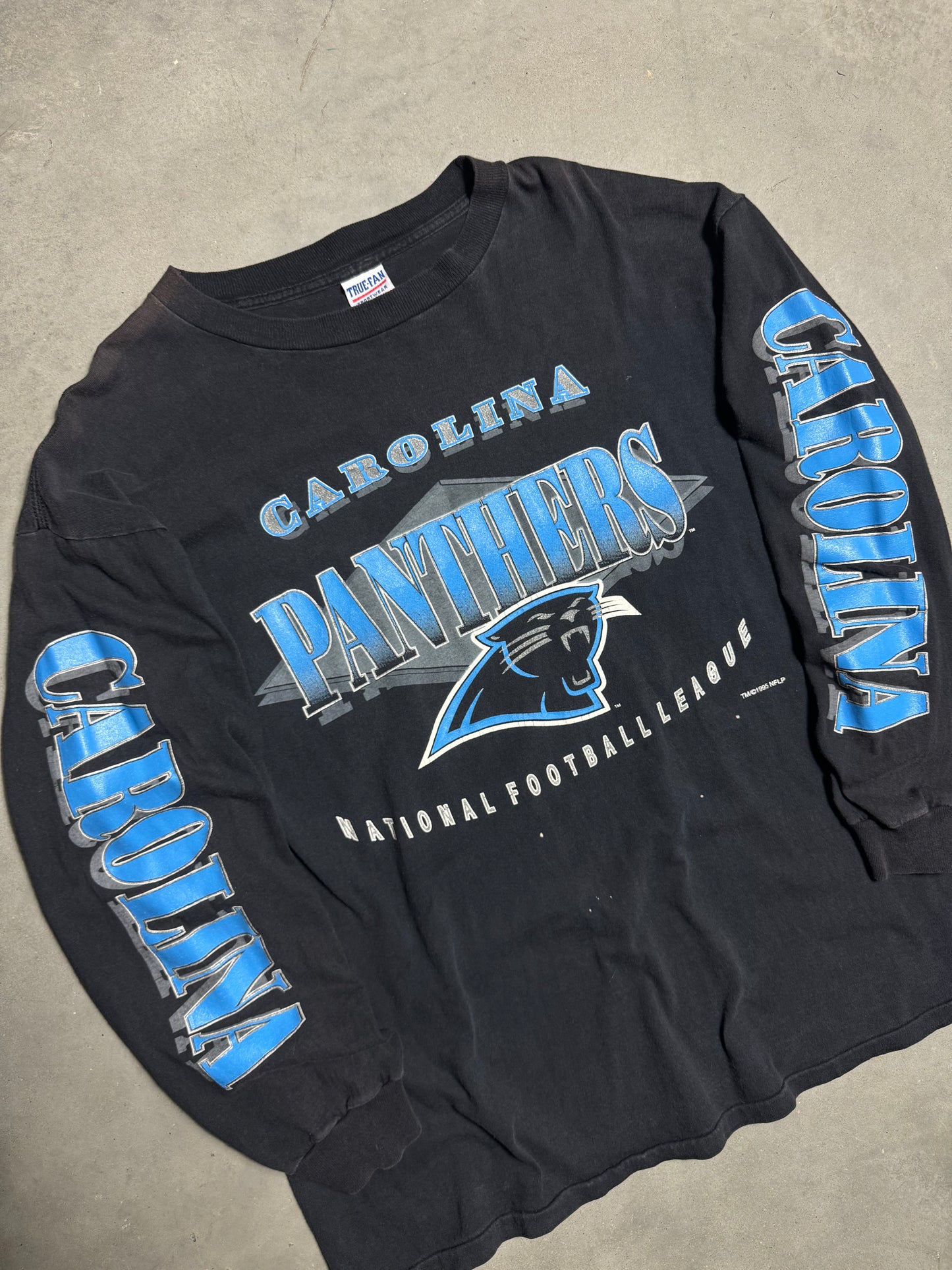 1995 Carolina Panthers Vintage Faded Black Arm Spellout Longsleeve NFL Tee (XL)