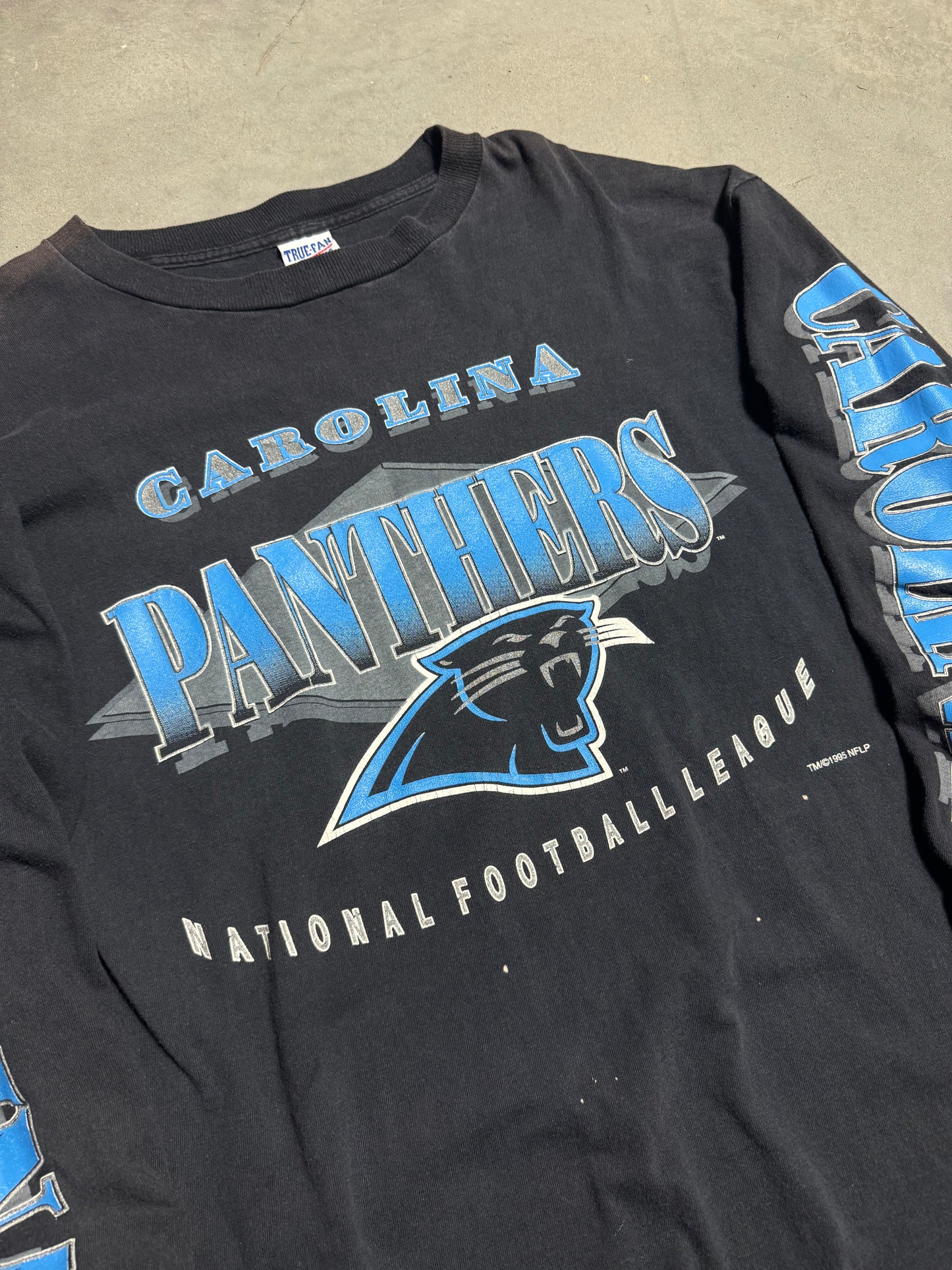 1995 Carolina Panthers Vintage Faded Black Arm Spellout Longsleeve NFL Tee (XL)