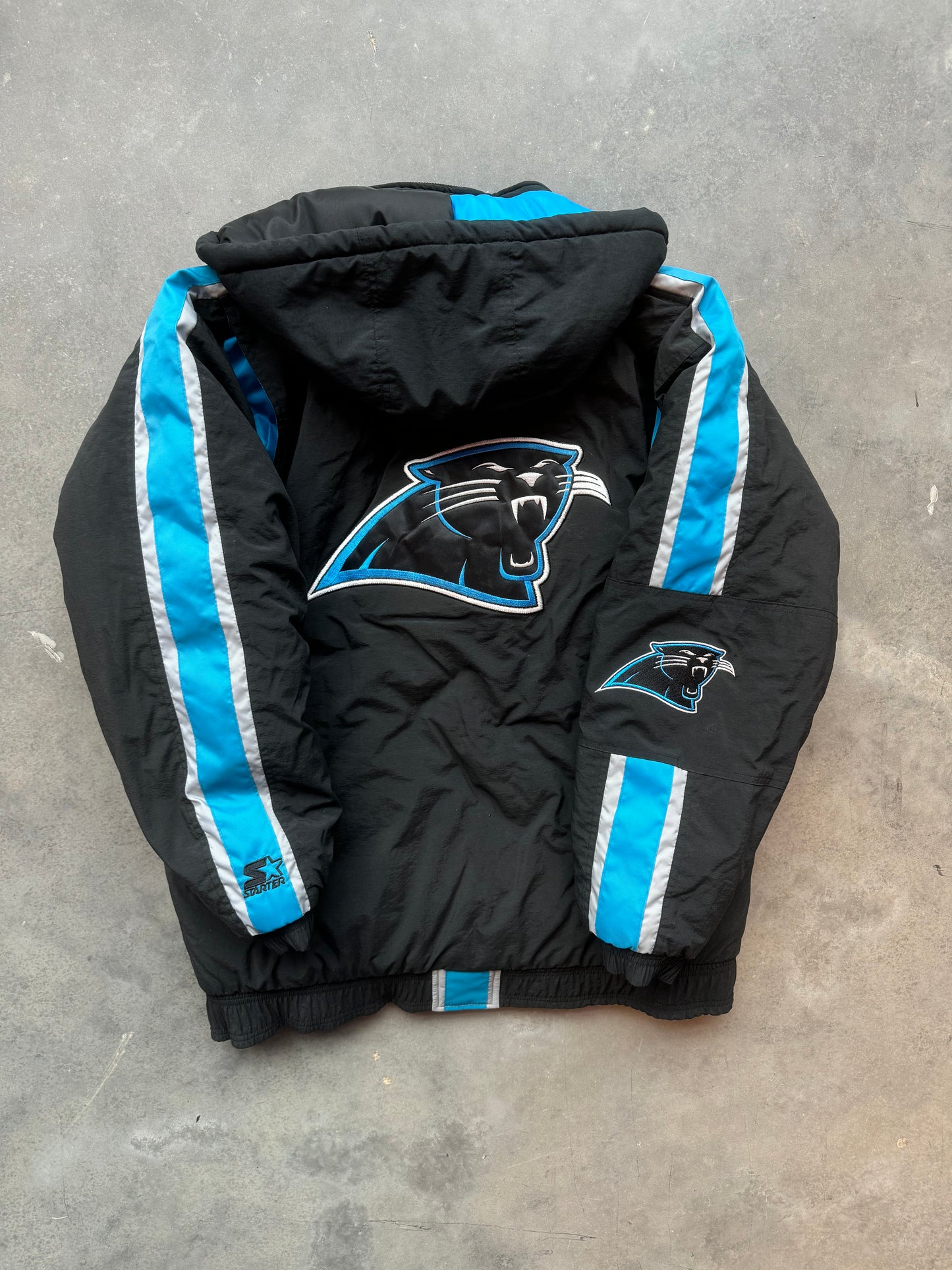 90’s Carolina Panthers Vintage Starter Spellout Striped Big Logo Black NFL Puffer Jacket (Large)