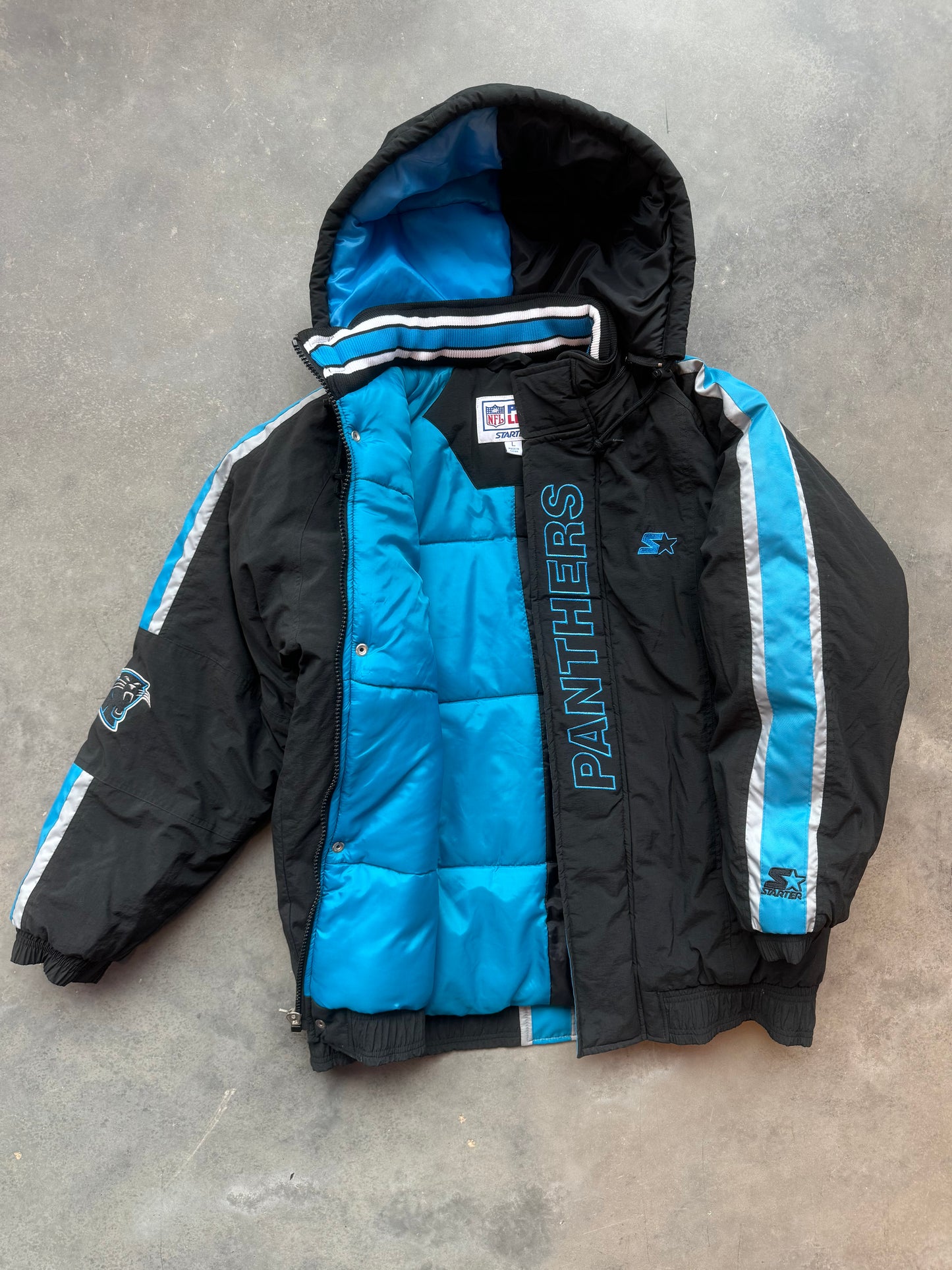 90’s Carolina Panthers Vintage Starter Spellout Striped Big Logo Black NFL Puffer Jacket (Large)