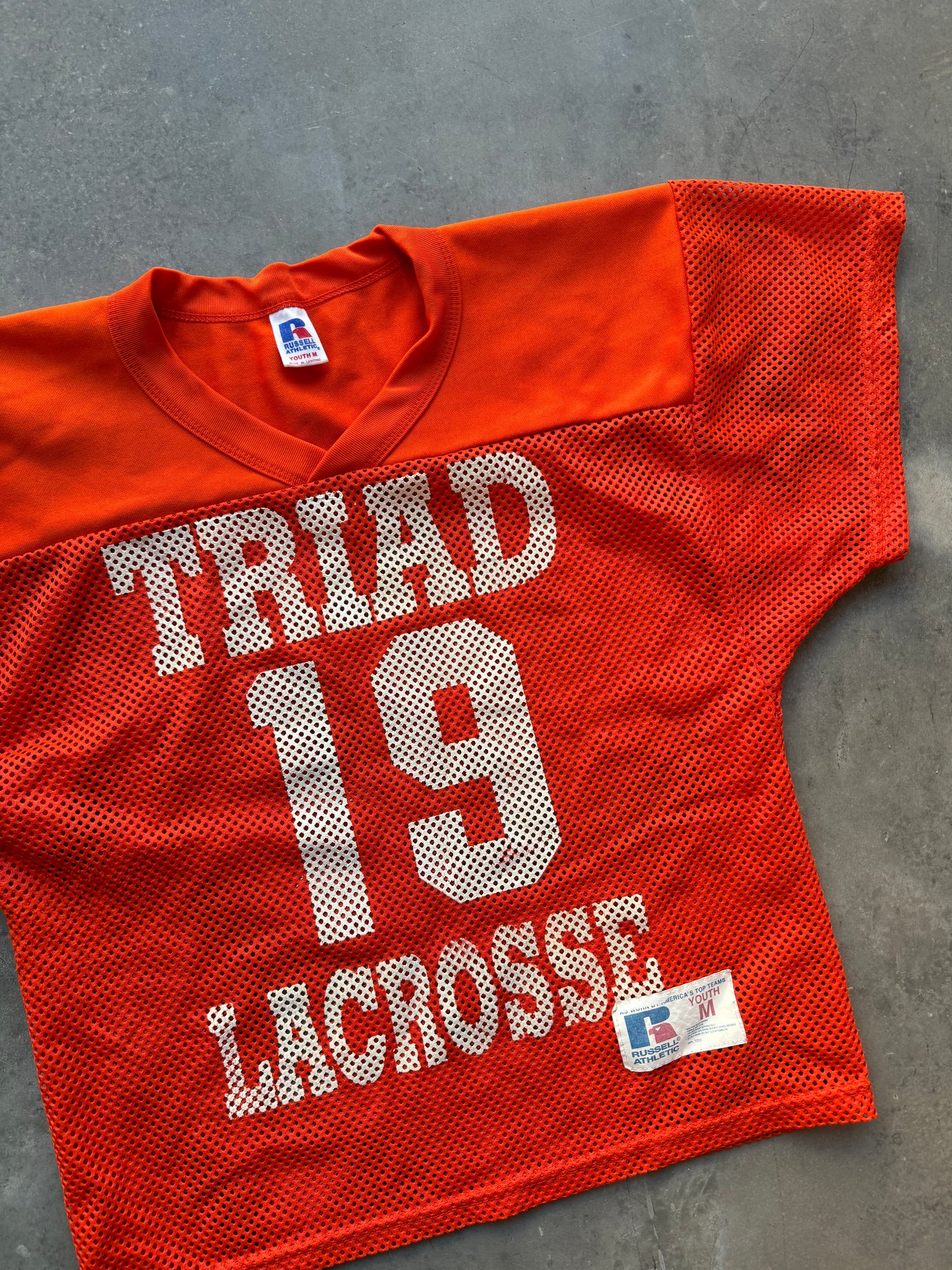 00’s Triad Lacrosse Russell Athletic Orange Mesh Jersey (Youth Medium)