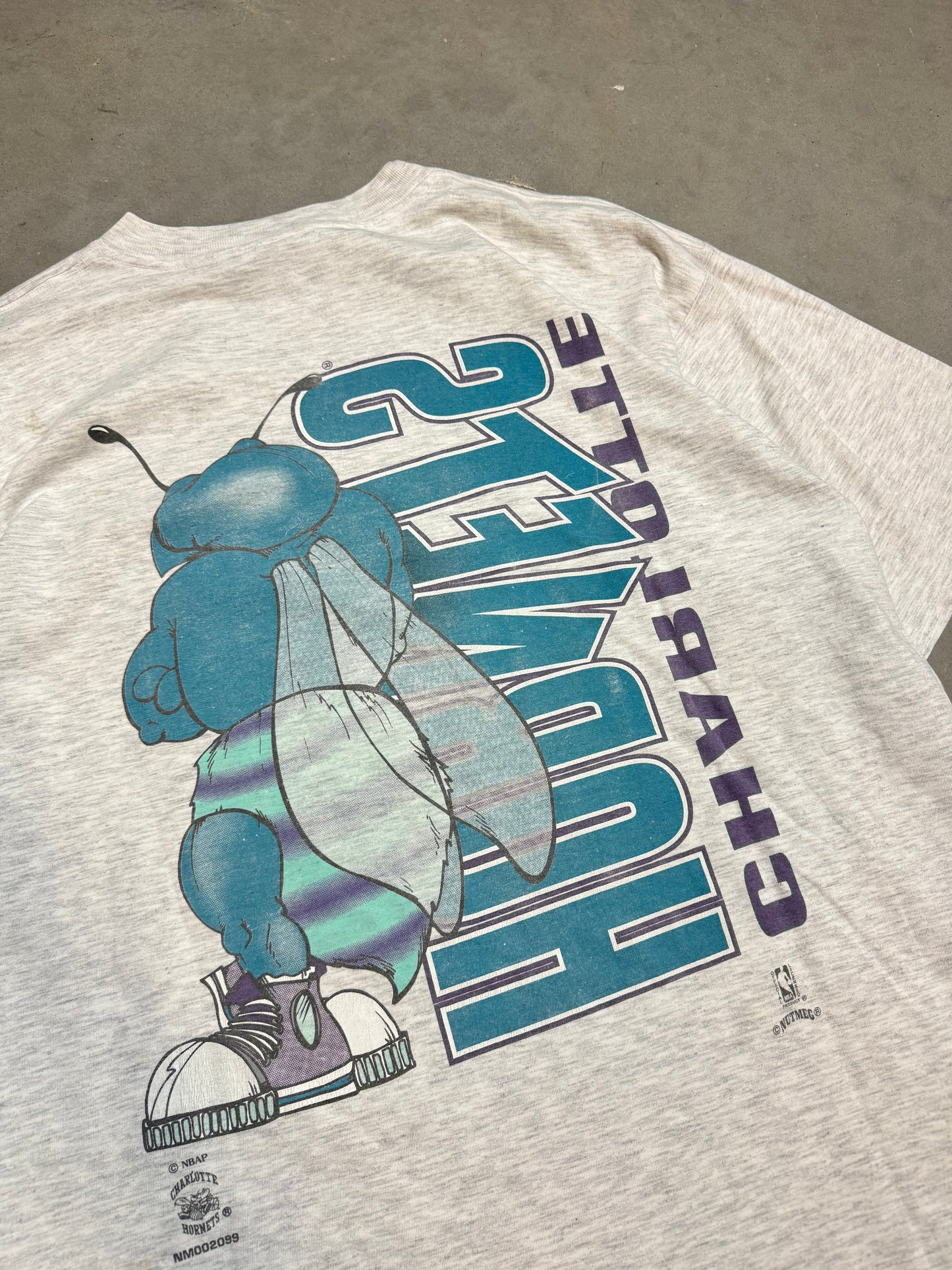 90’s Charlotte Hornets Vintage Nutmeg Mills Heather Grey Cartoon Hugo Logo Front & Back Mirrored NBA Tee (XL)