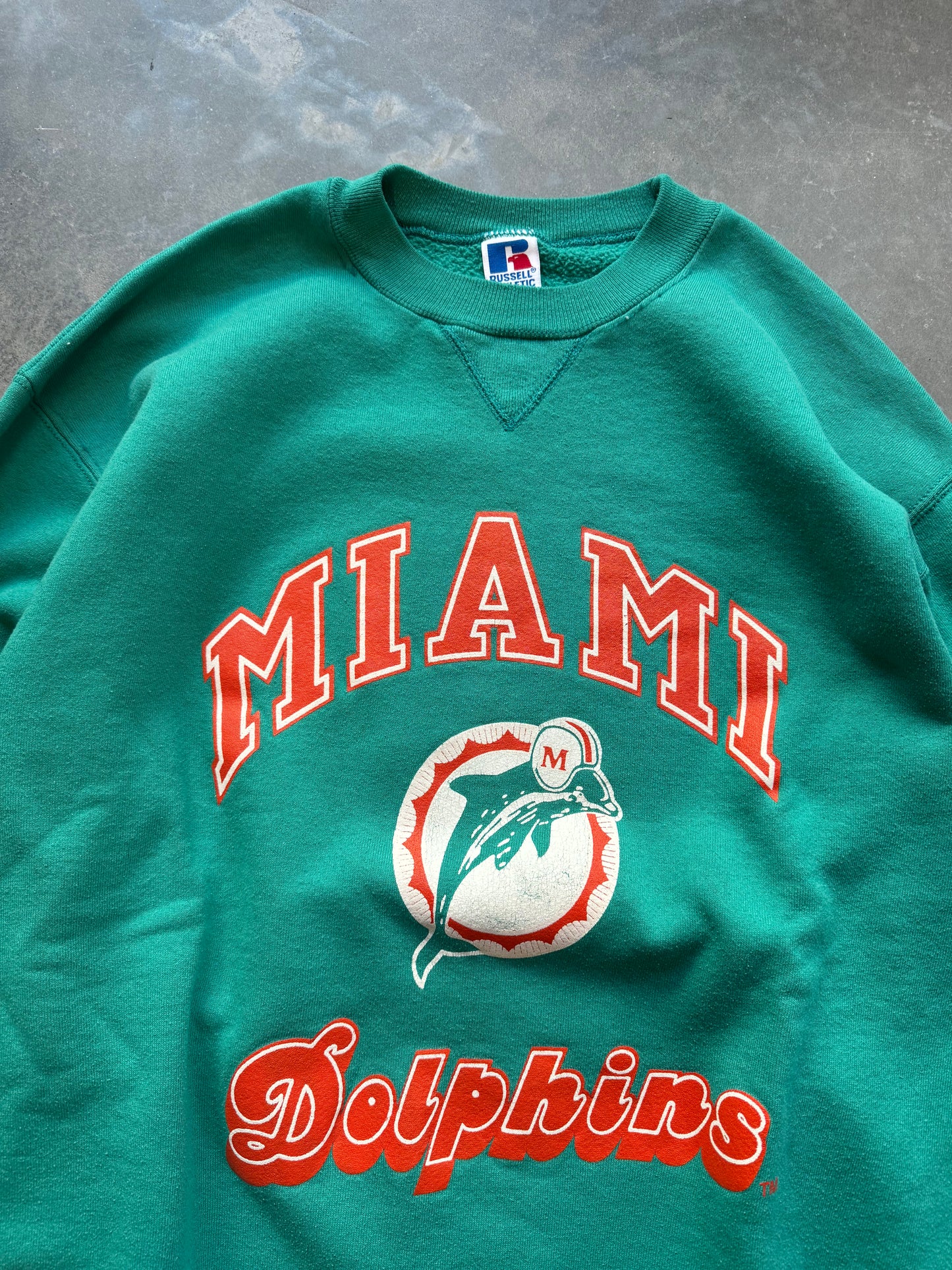 90’s Miami Dolphins Vintage Teal Russell Athletic Spellout NFL Crewneck (Large)