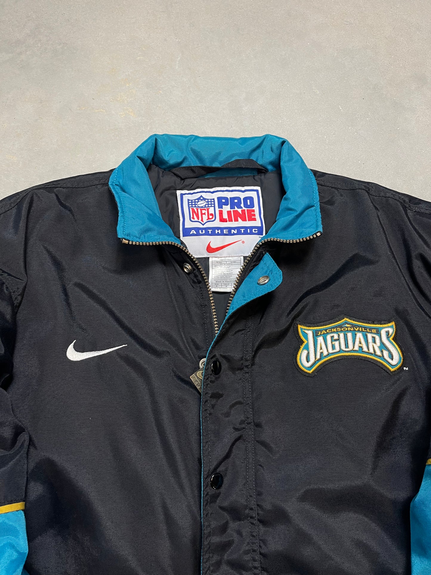 90’s Jacksonville Jaguars Vintage Nike Big Logo Puffer Jacket (Large)