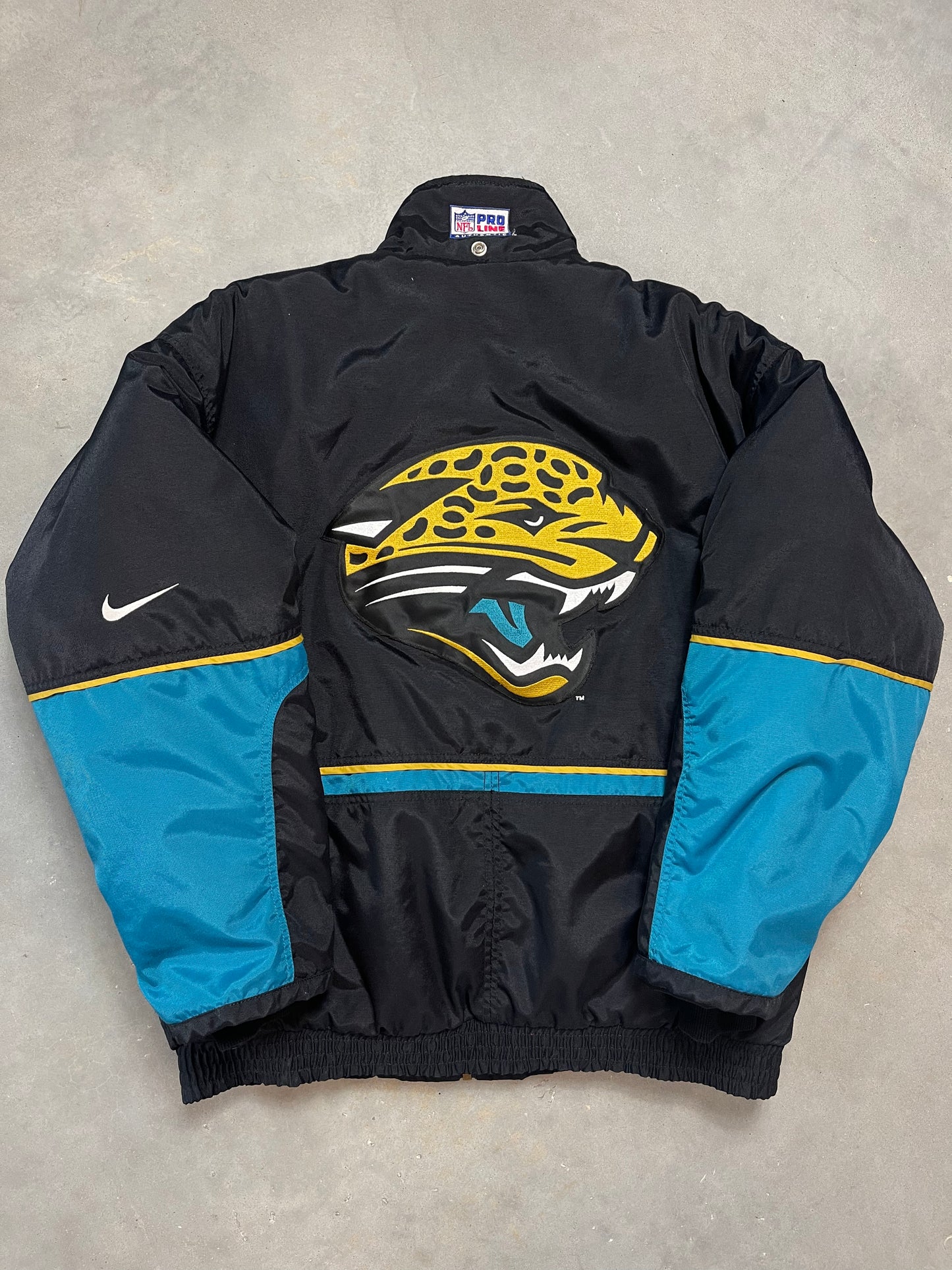 90’s Jacksonville Jaguars Vintage Nike Big Logo Puffer Jacket (Large)